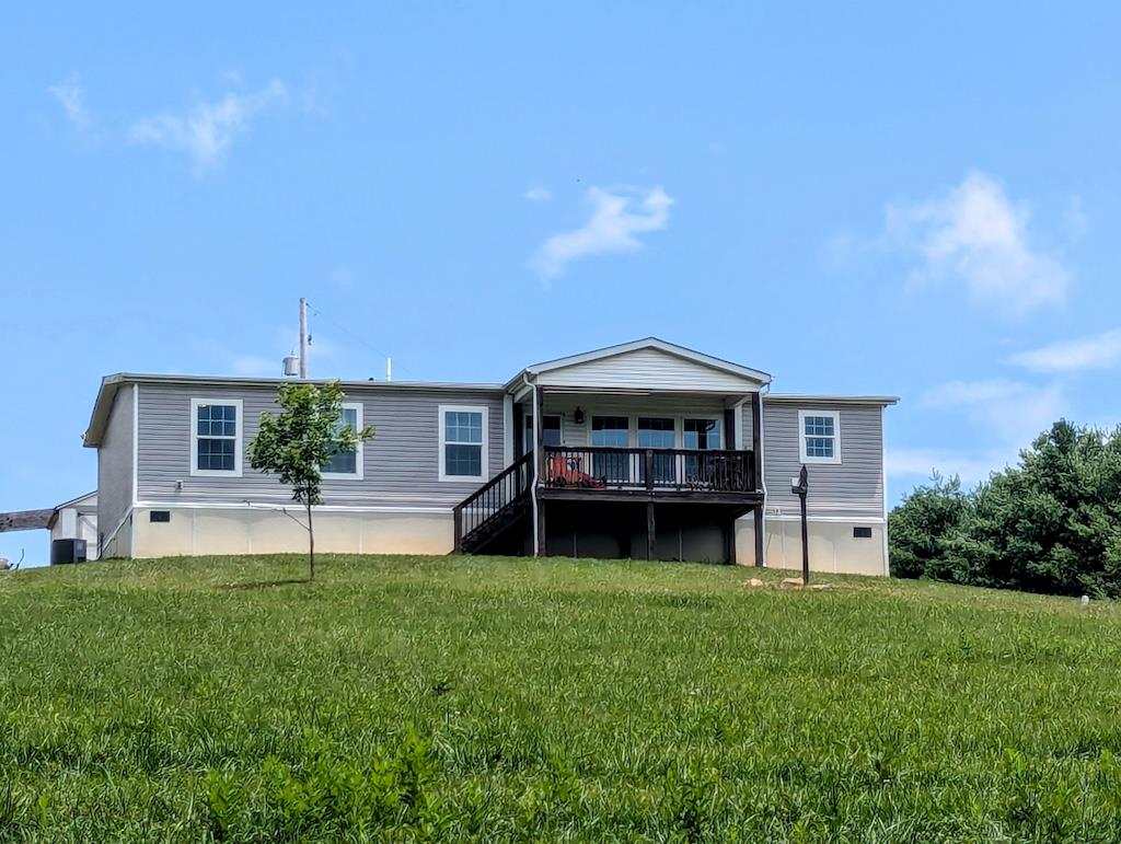 This country home offers over 1,500 sq ft, 3 BD, 2 BTH with an office space and is a 2020 year model double-wide constructed home on a permanent foundation. An easy commute to both Floyd and Hillsville but very private on a state maintained low traveled unpaved road. This property offers 6.39 acres of open land and a beautiful country view from the front porch. PRICED BELOW TAX ASSESSMENT!!
