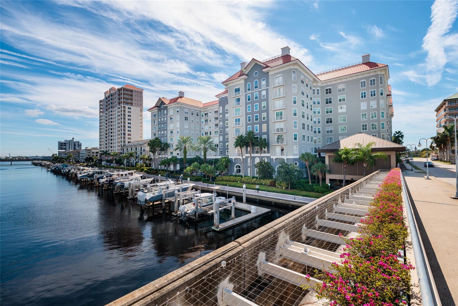 Enjoy luxury living in a (rarely available) Penthouse level waterfront condo on Harbour Island! Breathtaking waterfront, city scape and marina views await you in this 2 bedroom, 2 bathroom split open floor plan! Almost100K in updates with only the finest finishes, boasting 11 ½ ‘ceilings w/crown molding, 8’ doors, porcelain tile and engineered hard wood flooring throughout! The kitchen is a chef’s dream with Quartz countertops, 42”solid wood cabinetry w/soft close doors and drawers, top of the line stainless appliances including induction range, Advantium microwave, and French door refrigerator! Master bath has beautiful walk in shower, 2nd batha garden tub and both have solid wood cabinetry with granite counters! Generous bedrooms feature Plantation shutters and a continuation of city and water views. Upgraded dimmable lighting, fixtures and built-inscomplete these extensive updates. Amenities include water front pool and spa, 24hr security with gated parking garage, concierge services, gym, garden with fountain and lush landscaping. In addition, a business center,conference room, club house and game room. Walk to it all…University of Tampa, Outstanding Restaurants, Downtown life , Riverwalk,  Convention Center Armature Works, Straz, Amalie Arena, and the up and comingUSF Morsani college of medicine, Water Street and So much more.