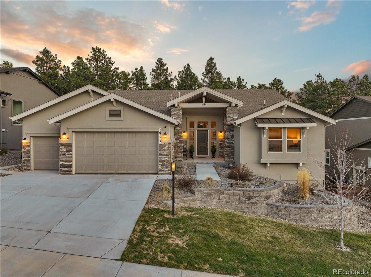 This home presents a rare opportunity to own not just a gorgeous home in Sanctuary Pointe, but one that backs to forested open space and the beautiful, natural hiking trails that run throughout this community and connect to Fox Run Regional Park! This ranch plan offers main-level living with a partially finished walk-out basement, ready to make perfect for your needs. 
Outside, this home has great curb appeal, with a stone and stucco exterior beautiful landscaping and elegant hardscaping. The back yard is private and tranquil, leading directly to the undisturbed forest beyond. Just steps away is the trail, which will take you as far through the forest as you desire. 
The back deck is where we expect you'll want to spend most of your time, and who could blame you? Perched eye-to-eye with the Ponderosa branches, perfect for spotting the local owls, chipmunks, squirrels, birds, deer and more. 
Inside, the entry offers two coat closets and views all the way back through the deck. 
The living room is cozy and open, with a gas fireplace, cushy carpeting and a walk-out to the deck. The adjacent kitchen gleams with white cabinets, granite countertops and stainless steel appliances, including a gas cooktop, wall oven and microwave, vent hood and French door refrigerator. There's also a spacious corner pantry. 
The primary suite is absolutely enormous, with big picture windows that will allow you to enjoy the forest outside in total privacy. The ensuite bath has separate vanities (the secret to peaceful mornings!) and a big glass shower with a seat and a large soaking tub, plus a linen closet.
The secondary main-floor bedroom has an adjacent full bath and downstairs you'll find the third bedroom and third full bath. 
Most of the walk-out basement is ready for your dream finish! 
This friendly, forested community offers two neighborhood parks and miles of stunning trails. Close to D-38 schools, shopping and major traffic corridors such as Hwy 83, Hwy 105, and I25.