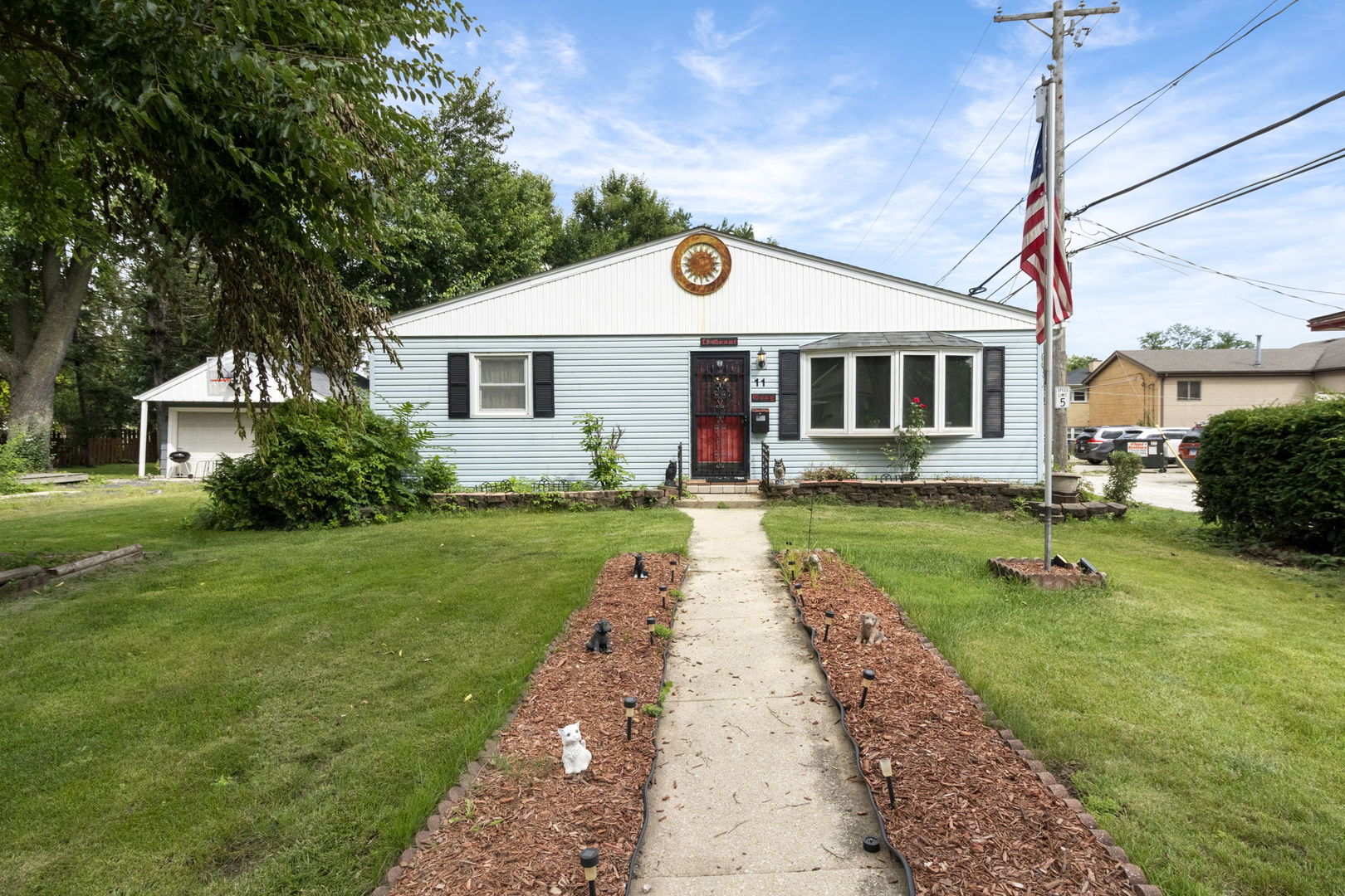 Discover your dream home at 11 N Grant St in Westmont! This charming residence features three spacious bedrooms and two full baths, including a master bathroom complete with a relaxing whirlpool tub and a fireplace. Enjoy summer days lounging by the above-ground pool in your fenced yard, perfect for entertaining or family fun. The property also boasts a one-car detached garage for added convenience. An addition was added to the property in 2004. With a newer AC and furnace (just 5 years old) and stunning Silestone countertops in the kitchen, this home combines comfort and style. Plus, you'll love the prime location - just a short walk to the train station and the vibrant downtown area. Don't miss out on this fantastic opportunity!