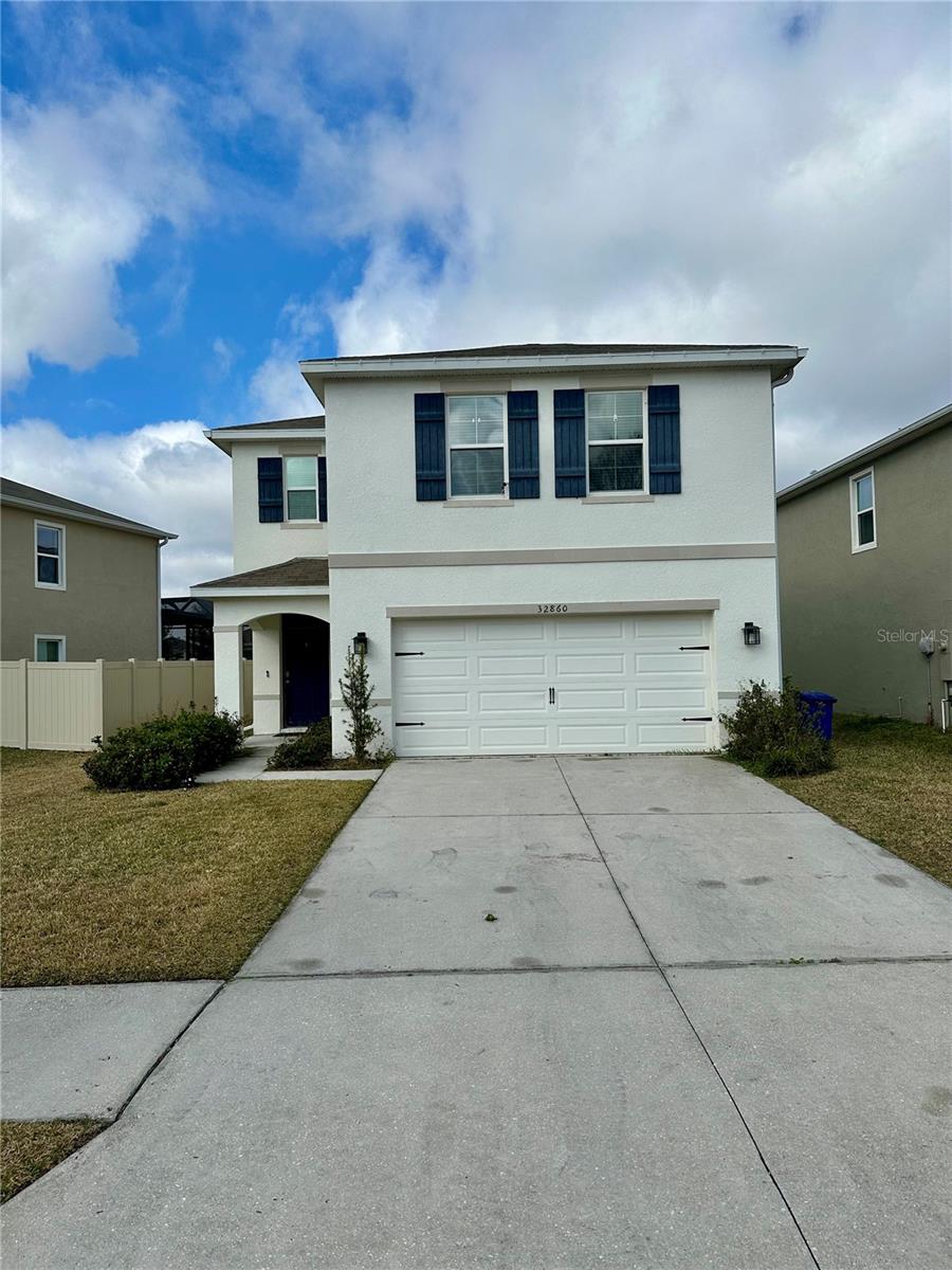 Welcome to this stunning home in the highly desirable, Union Park in the Meadow Pointe III community! This elegant 2260sq/ft residence offers two stories of spacious living area. This floorplan has a large master suite with a walk-in closet and a private ensuite bathroom. This home has a beautiful, spacious kitchen that opens out to the dining room/living room combination that creates an open and welcoming space for entertaining. Wait until you see your new kitchen which features granite countertops, stainless steel appliances, a pantry with ample cabinet space, and barstool seating, making it perfect for casual dining or chatting it up with some friends. Sliding glass doors lead from the living area to your back patio, providing a peaceful retreat. Upstairs, you'll find generously sized bedrooms, and a guest bathroom. For ultimate convenience, the washer and dryer are also located on the second floor. Resort-Style Amenities Include: access to the pool, clubhouse, fitness center, basketball courts, and a playground—everything you need for an active lifestyle! Prime Wesley Chapel Location! Located just minutes from The Shops at Wiregrass, Tampa Premium Outlets, top-rated schools, dining, and entertainment, with easy access to I-75 for a quick commute to Tampa. Don’t miss out on this incredible opportunity—schedule your showing today!The CONVENIENT LOCATION to the WIREGRASS Shopping Center, the TAMPA OUTLETS, and multiple grocery stores make daily life a little simpler, while the home’s proximity to I-75 leading into TAMPA makes experiencing the city only minutes away. Schedule your private tour today and fall in love with your next home!