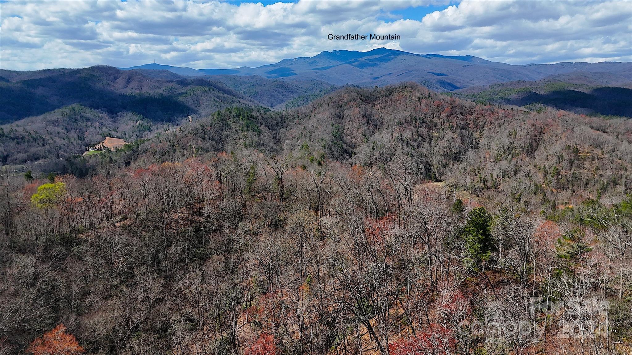 815 +/- acres, Caldwell Co.  
Beautiful quiet mountain retreat just 11 miles south of Blowing Rock, NC.  Complete with numerous trails and streams along the rhodedentron and mature trees.  Adjoins 4.5 miles of the Pisgah National Forest.  Recreation is bountiful.  Land is currenlty in forest management placing the land under annual reduced county land tax reduction.  Contact listing broker for access.  Access is currently in question.