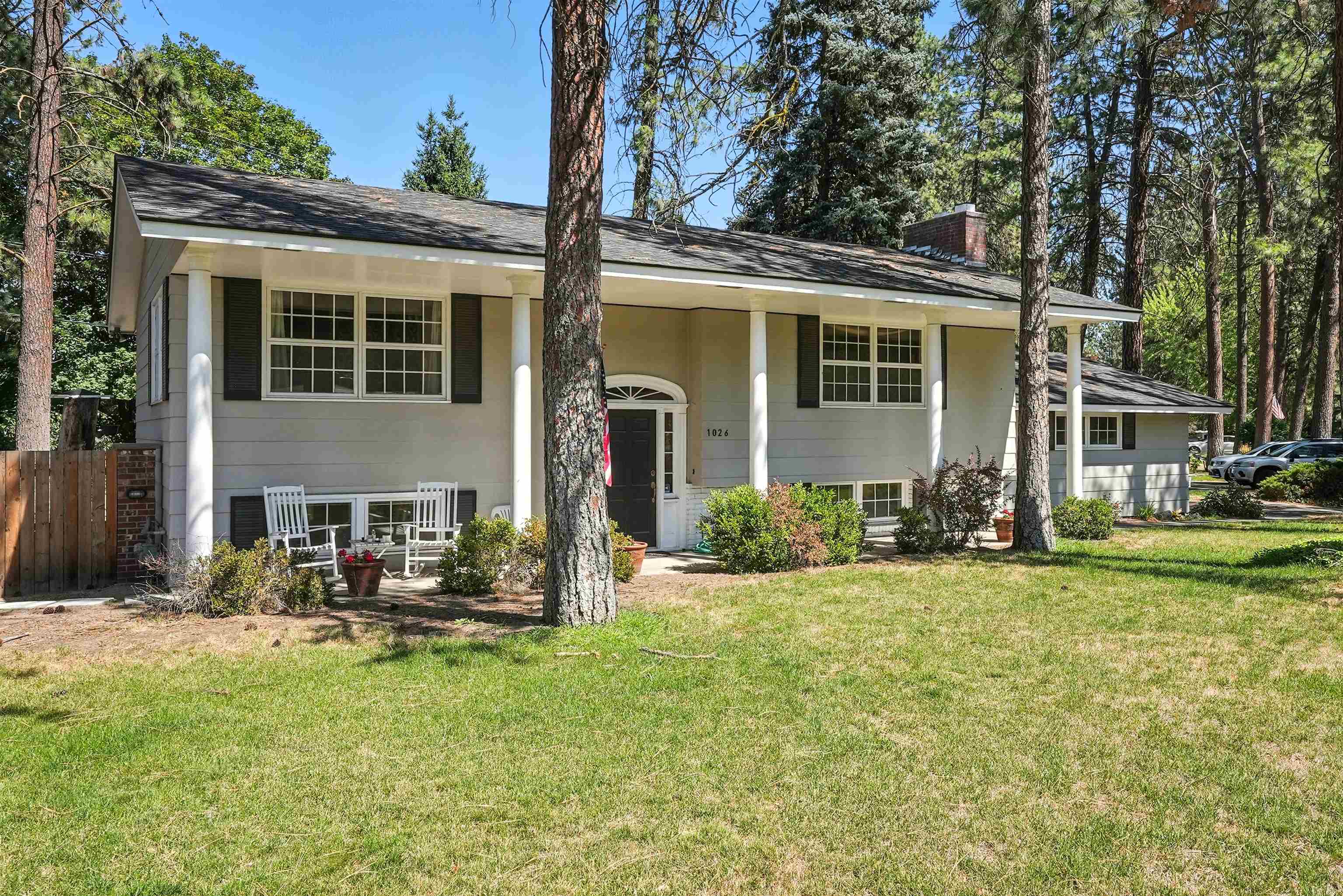 Come make this beautiful 3 bedroom 1.75 bath Colonial style California split your new home! Located in a peaceful neighborhood close to Mead High School, Whitworth College, and Northwood Jr. High. Plenty of grocery stores, shopping, and entertainment close by as well. Original hardwood floors all throughout upstairs complimented by a spacious open style tiled kitchen with eye catching black tile countertops. Roof completely torn off and replaced 2019. Brand new carpet in entire downstairs area with tiled downstairs bathroom and mud room that sits adjacent to the cozy office space accented with freshly stained and varnished hemlock French doors. Pella windows throughout home. Sits on almost 1/3 acre lot with a fenced back yard. Back yard has a dedicated space for a greenhouse with wiring already in place and a pathway just waiting for pavers to be put in it to lead you to a future relaxing patio area or gazebo. Come make this your forever home!