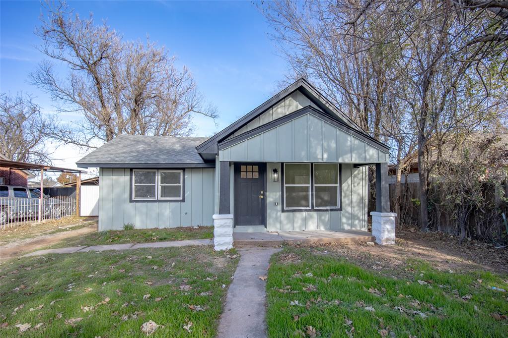 Welcome to this well-maintained two-bedroom home offering a spacious layout and thoughtful features throughout. The large primary suite includes an expansive walk-in closet and convenient access to a private safe room located down a short set of stairs. The full bathroom features a tub/shower combination, and an additional powder bath adds extra convenience for guests.The kitchen provides generous cabinet storage, matching stainless steel Frigidaire appliances, and a pot filler for added functionality. Hardwood floors extend through the living room and both bedrooms, while the kitchen and dining area feature wood-look LVP flooring. Tile flooring is found in the hallway and both bathrooms, offering durability and easy maintenance.Outdoor spaces include a covered front porch and a covered patio deck, providing comfortable areas to relax or entertain. This home combines practical design with quality finishes, ready for its next owner.