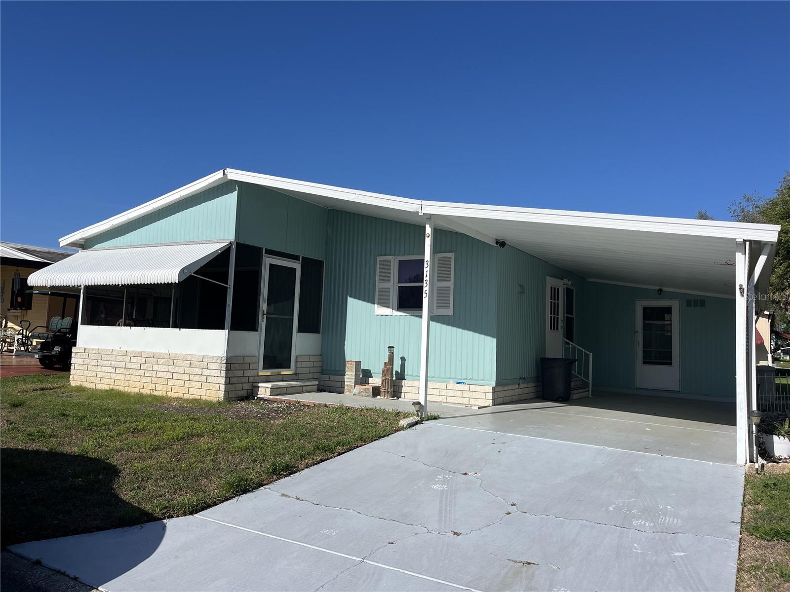 Stop renting and start owning! This well maintained 2-bedroom, 2-bathroom residence offers an inviting open floor plan filled with natural light. The interior features a charming coffee bar, a dedicated dining space, and a spacious master suite complete with a walk-in closet and private shower. The seller is currently replacing bedroom carpets and installing brand-new, durable vinyl flooring throughout, ensuring a fresh and modern move-in experience. Peace of Mind: Features a durable metal roof and a newer HVAC system for energy efficiency and low maintenance. Outdoor Living: Relax on the front screened porch and enjoy the Florida breeze.Located in a highly secure, gated community with NO age restrictions and NO lot rent. The low monthly HOA fee covers essential services: water, sewer, trash, lawn maintenance. Residents enjoy resort-style amenities including 2 swimming pools, 2 clubhouses, billiards, and shuffleboard.Unbeatable Location:Minutes away from Wiregrass Town Center, major grocery stores, top-tier eateries, gyms, and salons. Pet-friendly (breed restrictions apply).Don’t miss this incredible opportunity to own a turnkey home in a vibrant, welcoming neighborhood. Contact us today for a private tour!