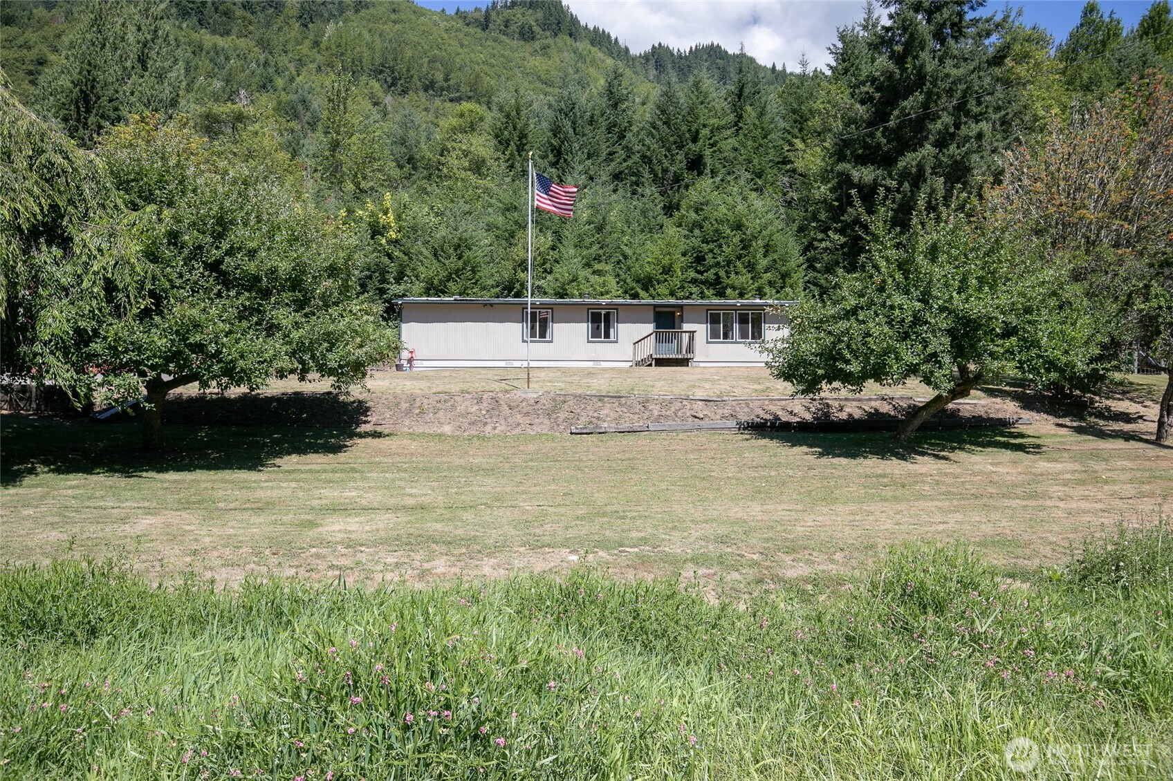 Imagine waking up every morning in peaceful country living, breathtaking 360 mountain & forest views !     Set on 2.99 acres, this lovely cared-for double-wide manufactured home is ready for someone to make it their own. From the moment you arrive, you’ll see the pride of ownership that has gone into this property.    Inside, you’ll find a 2-bedroom, 2-full-bath home with an office room that can easily become a home office, craft room, guest space, or whatever your lifestyle calls for. Numerous updates make this home feel fresh & inviting, including newer carpet and flooring, new windows, two AC units, a primary shower, updated stainless-steel appliances.    The shop—an absolute dream for anyone who loves working on vehicles, tackling projects, or simply needs serious space! An impressive 36’ x 48’ with 16’ ceiling, features an in-ground lift, air compressor, & an attached 12’ x 48’ lean-to. Whether you’re a hobbyist, mechanic, outdoor enthusiast, or simply someone who appreciates having room for all the toys and tools, this space is sure to impress.    Outside, possibilities are endless. There’s RV and boat parking, plenty of driveway space, established fruit trees, and room to enjoy the outdoors in your own private country.        Properties like this don’t come along every day. Come see for yourself before someone else gets to call it home!  Located minutes from Riffe Lake , the dam,  White Pass and so much more. Buyer to verify any and all information!
