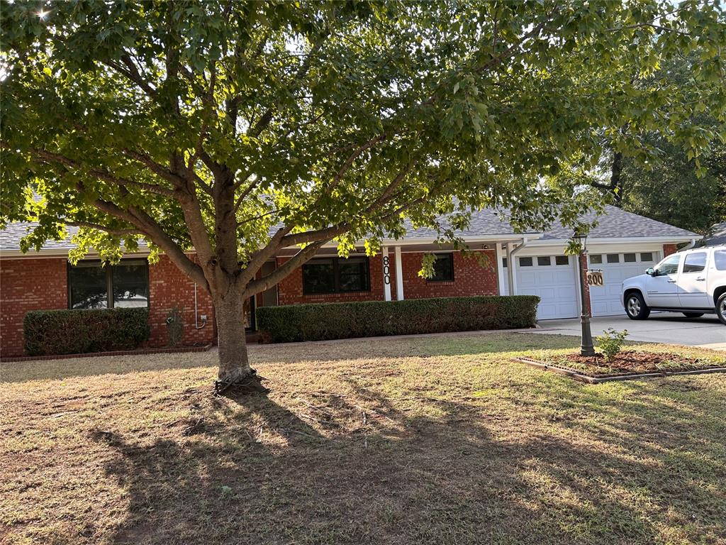 Lovely mid-century ranch located in highly sought after Lincoln Terrace. Easy walk to campus, in the heart of Norman, with tree lined streets. Many modern upgrades throughout including new quartz countertops, appliances, faucets, sinks, light fixtures, ceiling fans and flooring. All three bedrooms are oversized, with walk-in closets. There are three pantry's, and numerous cedar-lined built-in's in hallway for additional storage, including a large walk-in closet. The main living room includes a beautiful stone gas fireplace that could easily be converted back to wood burning. There is a huge bonus room, which is large enough for additional living space along with a pool or ping-pong table, and floor to ceiling windows and doors. The laundry room includes a half bath. There is an additional mudroom, with room for extra refrigerator or freezer. The yard has an irrigation system that has been recently inspected. The back patio is covered. The back yard contains a large two room out building, with electricity. New hot water tank was installed this year. The roof is 3 years old. The backyard contains a storm cellar. This home has been meticulously cared for.