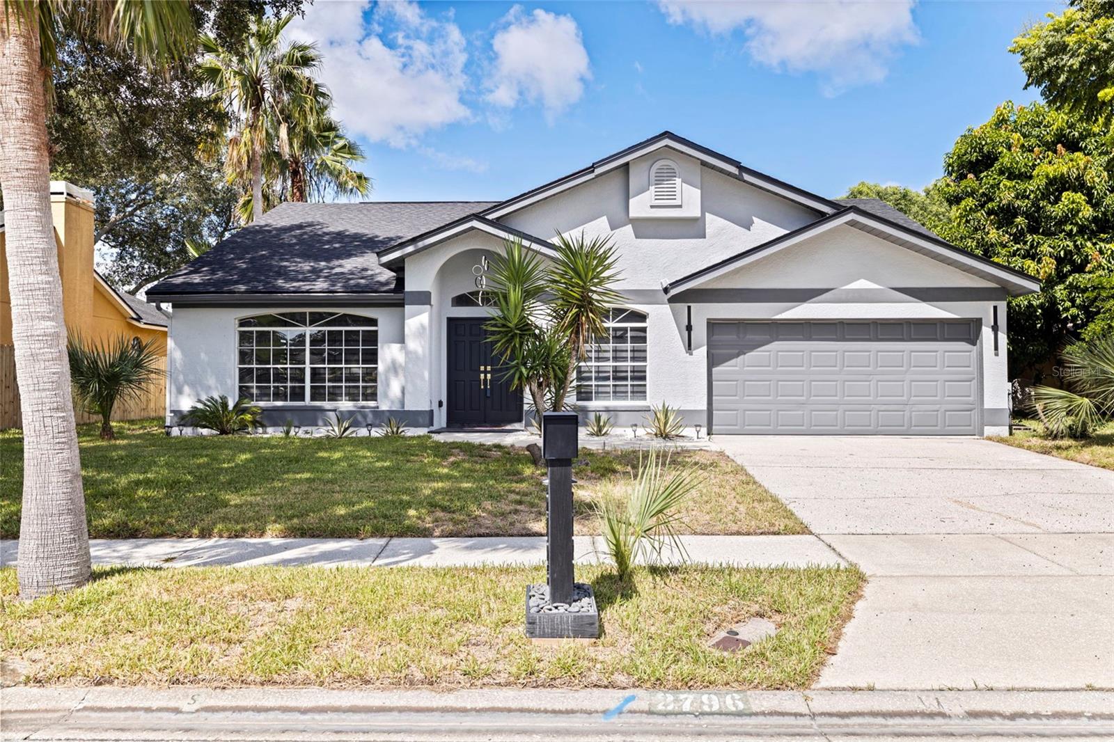 LOCATION, LIFESTYLE AND A BEAUTIFULLY REMODELED POOL HOME COME TOGETHER AT 2796 CHALLENGER DRIVE! Welcome to Waterford Crossings, a highly sought-after Palm Harbor community where a friendly neighborhood atmosphere meets an enviable location. Beautifully remodeled from top to bottom, this 4-bedroom, 2-bath pool home showcases a sleek, contemporary design with clean lines, high-end finishes, and a comfortable open-concept layout designed for the way you live today. At the heart of the home, the gourmet kitchen features modern cabinetry, quartz countertops, and premium stainless-steel appliances, all new in 2026. The living spaces flow effortlessly together, creating an inviting setting for both everyday living and entertaining. The primary suite offers a true resort-style retreat, complete with a luxurious standalone soaking tub and an oversized walk-in shower, creating a beautiful space to unwind at the end of the day. The secondary bathroom has also been thoughtfully updated with contemporary finishes. Step outside and the Florida lifestyle truly comes alive with a newly resurfaced pool featuring a Pebble Tec finish and gorgeous glass tile, completed in 2026. The pool and surrounding outdoor space provide the perfect setting for relaxing, entertaining, and enjoying Florida’s year-round sunshine. Major updates include a NEW ROOF in 2026, HVAC replaced in 2025, Hot Water Heater 2018, luxury vinyl flooring throughout, updated kitchen & bathrooms, lighting and window treatments throughout, interior/exterior painting, built in features plus much more! Located in Flood Zone X (flood insurance is not required), adds another layer of appeal and peace of mind. Waterford Crossings offers low HOA fees, while its location puts you just minutes from Honeymoon Island State Park and the pristine beaches of Caladesi Island, as well as the Pinellas Trail. Enjoy easy access to the charming downtowns of Dunedin and Palm Harbor, Clearwater Beach, boating, golf, shopping, dining, and countless other recreational opportunities. Whether you’re looking for a full-time residence, Florida retreat, or simply a home where you can enjoy the best of the coastal lifestyle, 2796 Challenger Drive delivers the combination of sophisticated remodeling, resort-style outdoor living, community, and LOCATION that makes Palm Harbor so desirable. Check out the 3-D tour!
