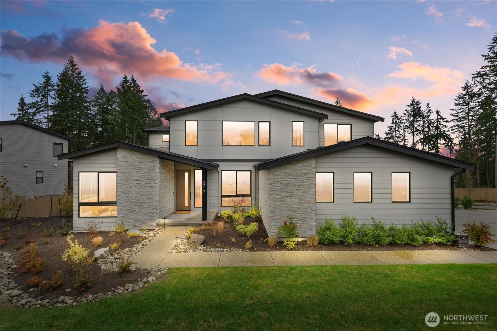 Better-than-new luxury Northwest Contemporary home on a fully landscaped 1/3-acre fenced lot on a cul-de-sac.This sophisticated 3,960 sq ft home features a covered porch,grand entry, main-floor den,and guest suite with ¾ bath.Stunning great room offers a floor-to-ceiling tile fireplace that leads to a covered outdoor living area with gas firepit and automatic shades.Gourmet kitchen showcases high-end appliances,a 14-foot quartz waterfall island,coffee bar, and walk-in butler’s pantry, which flows to a light-filled dining area. Upstairs, features a primary suite with a soaking tub,walk-in shower,heated floors,and walk-in closet,3 additional bedrooms, one en-suite,plus a bonus room.A/C,finished garage,Ev/220 plug,and custom window treatments.