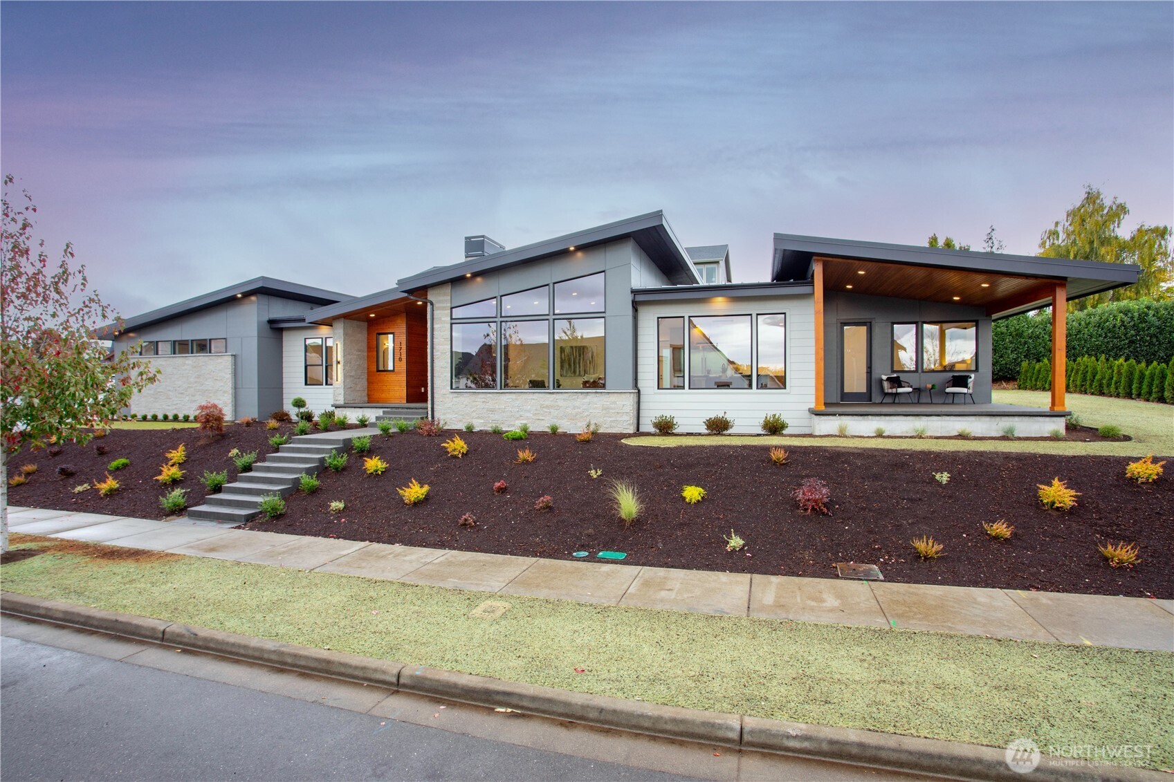 Just completed, this custom one-level home blends high-end finishes w/ thoughtful design in the desirable west side of Lynden’s Blankers Estates. Set on a large 14,000 sq ft lot, enjoy south-facing views of Mt. Baker and the Nooksack Valley. The open floor plan offers 4 bedrooms (or 3 plus office), 2.5 baths, a lg utility room, & chef’s kitchen with premium appliances, quartz hood, accent lighting, full-height cabinets, spacious island & walk in pantry. The primary suite features heated floors, tiled vanity walls, zero-threshold glass shower, and lg walk-in closet. A metal roof and maintenance-free metal fascia add lasting quality. Entertain year round on the covered patio with beautifully landscaped yard including in ground sprinklers.