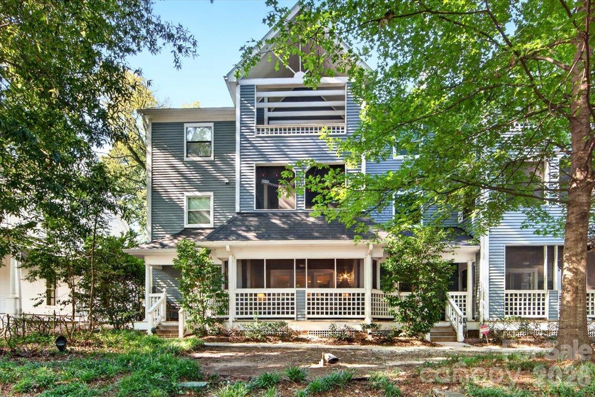 RARE first-floor, end unit condo in the heart of historic Dilworth that has been completely renovated and includes a huge screened-in porch AND private fenced-in backyard (complete with fire pit)! This 2 bedroom, 2 full bath condo offers the perfect blend of low maintenance living without sacrificing on location or outdoor space. The renovated kitchen is stylish and functional, featuring new cabinetry, quartz countertops, and under-cabinet lighting. Both bathrooms have been renovated with new flooring, custom glass shower door in primary, added storage, new fans, lights, and vanities. Additional updates to the interior include new windows and doors throughout, French doors opening to the screened-in patio, new entry door with additional screened door, new primary closet build out, all new light fixtures, additional storage, and a new fireplace insert. Assigned parking right next to the units back entrance, and additional street parking at the units front entrance, provide added convenience to an already wonderful location. Enjoy convenience to neighborhood restaurants, Latta Park, tennis courts, the Dowd YMCA, rail trail, the Blue line, and more!