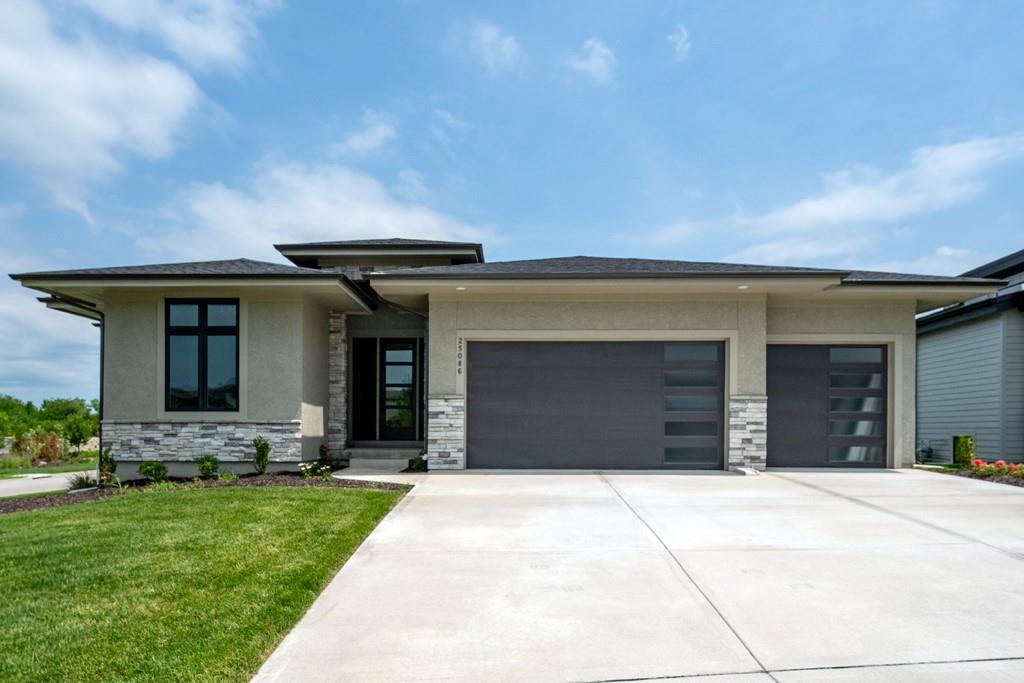 Gorgeous "SAVANNAH" plan by Gabriel Homes! Bright and open main floor living with tall ceilings and windows! See-through fireplace in great room for year-round indoor/outdoor entertainment. Impressive kitchen with large island, pantry and dining area! The main level includes a 2nd bedroom/office as well as a luxurious Primary Suite with shower and free-standing tub. Lower level is complete with a recreation room, 2nd fireplace, wet bar, and two additional bedrooms. Many upgrades in this fabulous floorplan. Full access to Cedar Creek amenities including 3 pools, clubhouse, party room, 65-acre fishing lake, parks, pickleball courts, walking trails and more. Taxes and room sizes are approximate. Home is back on the market through no fault of the seller.