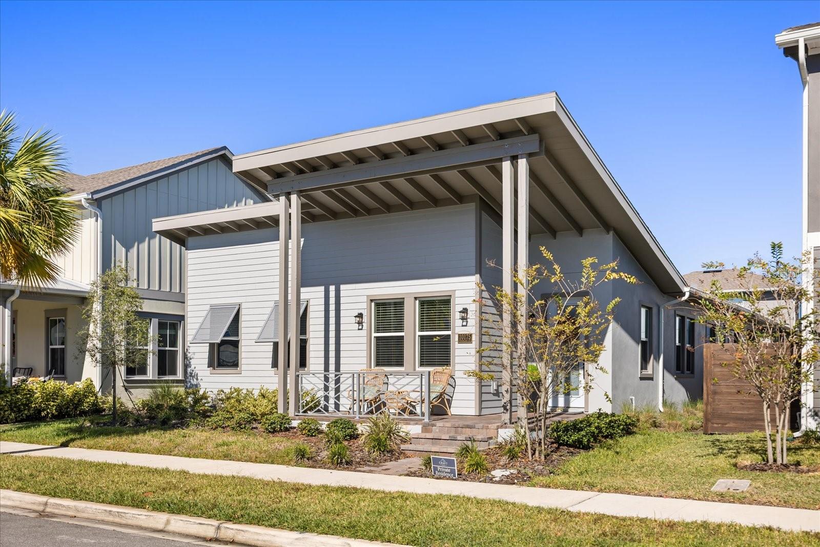 HOME SWEET HOME! Come set your eyes on this beautifully updated Tanner model by Craft Homes in Laureate Park. This Stunner has it ALL and MORE! Your eyes will be drawn into this home's Modern Elegance, Top-of-the-Line Upgrades, combined with an Open Floor Plan. High-End Laminate Flooring is throughout the home with Ceramic Tile in the Bathrooms. If you love to cook or entertain, you'll appreciate this Stunning Gourmet Kitchen that features Quartz Countertops, Stainless Steel Appliances, Farm-House Sink, a Spacious Island with Upgraded Lighting and a Built-In Bar and Wine Fridge. The Living Room is rather large with an Electric Fireplace and Stylish Mantel. The home features a Split-Bedroom Floorplan with the Primary Bedroom located at the back of the home with an Extra-Large En-Suite that features Double Walk-In Closets, Double Sinks, and the LARGEST Shower you've EVER SEEN!  On the other side of the home, you'll find two more Bedrooms and an appointed Bathroom. Additional features include a premium lot, 12-foot ceilings, Energy Star certification, there is also pre-wiring for surround sound and ample storage throughout.  The Back-Yard features a Large Lanai with Pavers which is great for relaxing and/or entertaining as well as your 2-Car Garage. Come enjoy everything that Laureate Park and Lake Nona Medical City has for you including 44 miles of walking, jogging, and bike trails along with Top-Notch Amenities including an Aquatic Center as the Community Pool, plus a Playground and Fitness Center with lots of restaurants nearby. Don't miss your chance to make this house your home!