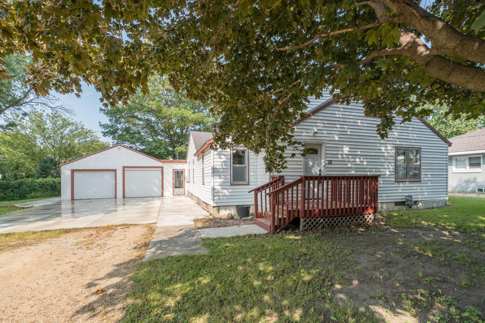 Discover this charming 3-bedroom, 1-bath home located in Eagle Lake. The home features a spacious living room perfect for relaxing and entertaining. On the main floor, you'll find two bedrooms and a full bathroom, while the private primary bedroom is upstairs, with built-ins offering plenty of space and storage. The property includes a convenient two-stall garage along with additional parking space for guests or recreational vehicles.  Schedule your private tour today.