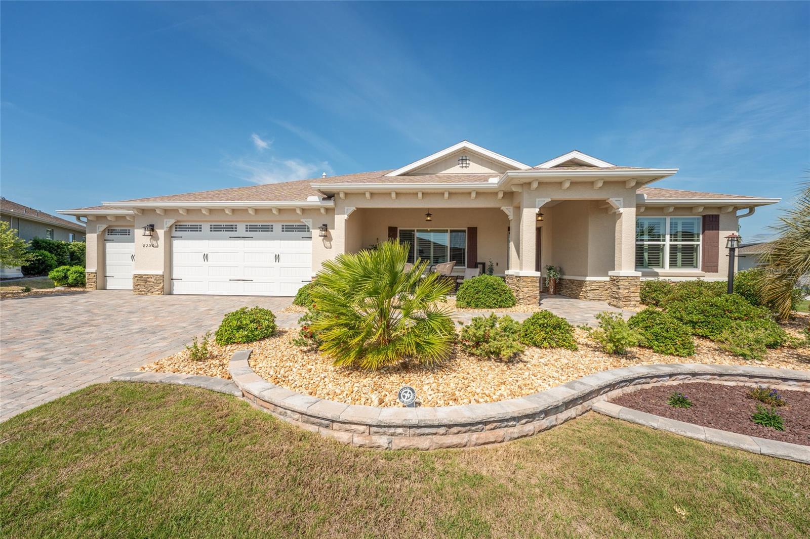 Step into refined, resort-style living in this immaculate 2021-built home located in Candler Hills at On Top of the World—one of Ocala’s most sought-after 55+ communities. Offering 2,097 square feet of beautifully curated space, this 2-bedroom, 2-bath residence with a spacious flex room blends comfort, elegance, and thoughtful design.  From the moment you enter, you’ll notice the elevated details and upscale designer finishes throughout. The gourmet kitchen is a showstopper, complete with quartz countertops, a gas range, tiled backsplash, and soft-close cabinetry, all seamlessly flowing into a bright open-concept living area ideal for entertaining. The primary suite serves as a private retreat, boasting custom his-and-her closets and a spa-like ensuite bathroom designed for relaxation. Step outside to enjoy meticulously landscaped grounds, highlighted by paver walkways that enhance both beauty and function. Car enthusiasts and hobbyists will appreciate the expansive 3-car garage with epoxy flooring, plus a dedicated golf cart bay for added convenience. Additional features include luxury vinyl plank flooring, custom window treatments, and a well-equipped laundry room with built-in storage and utility sink.Living in On Top of the World means embracing an active, vibrant lifestyle with access to world-class amenities—clubhouses, multiple golf courses, resort-style pools, fitness centers, social clubs, and endless recreational opportunities. This exceptional home offers the perfect blend of luxury, comfort, and community. Schedule your private showing today and experience it for yourself.