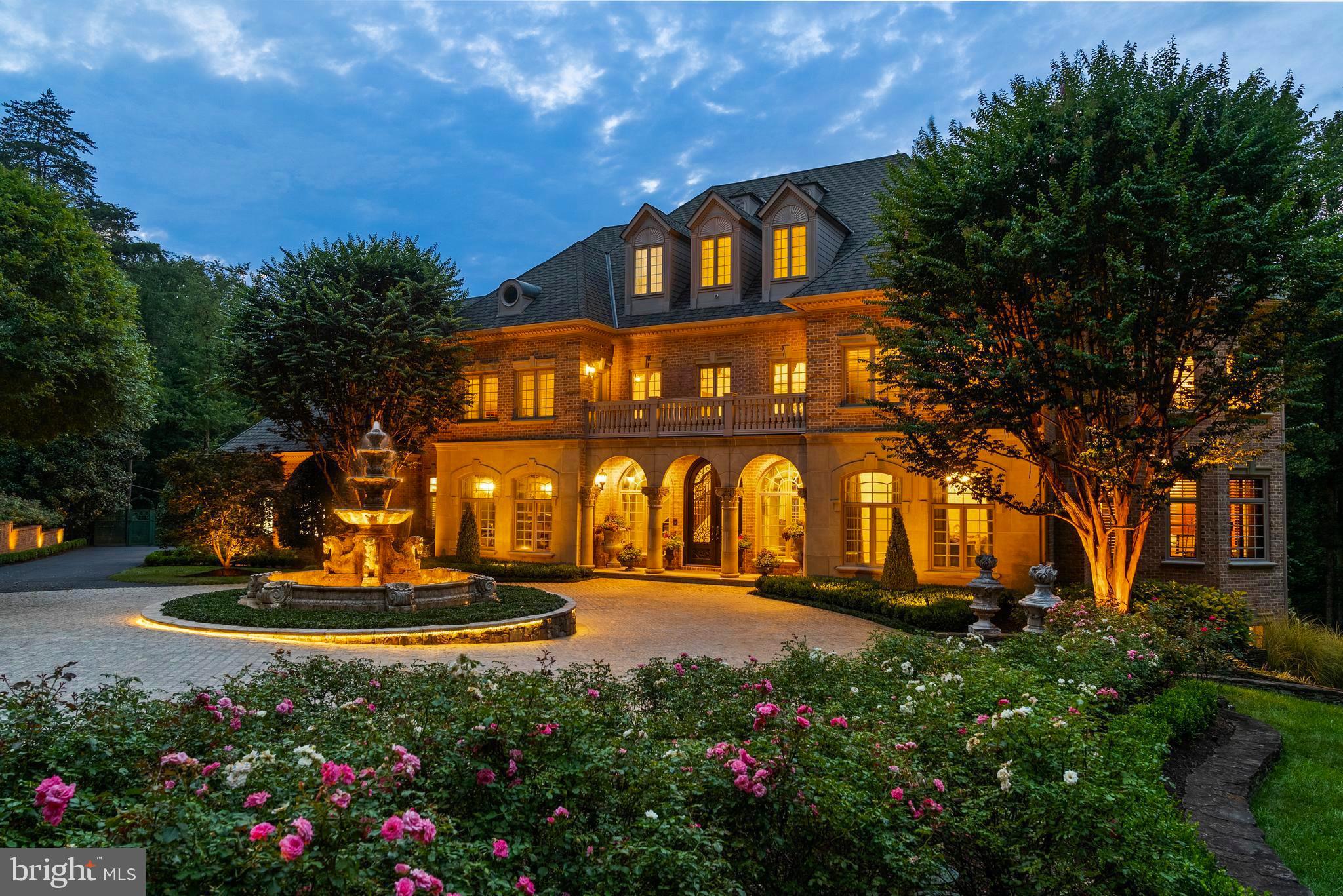 THE ESTATE AT MINE RUN:Nestled in  the blissful hills surrounding Great Falls Park is a masterpiece of old-world craftsmanship and modern appointments. Encompassing approximately 5.44 acres of secured land; this estate affords a unique combination of privacy and accessibility.  Passing through the stately front gates is a breathtaking tree canopied sweeping driveway which culminates at the main residence with its commanding motor court and majestic fountain. The spectacular grounds feature lush specimen plantings, stunning hardscape, antique sculptures, Haddonstone garden gazebo, fountains and so much more!  The handsome facade showcases lovely arches and ornate precast columns. Step into the breathtaking foyer, where your greeted by stunning Swarovski crystal chandeliers in every room, with gleaming marble floors and soaring ceilings setting a tone of timeless grandeur. Stunning plaster moldings with gold appointments and bespoke millwork flow from the foyer seamlessly into the living, dining and great room creating an elegant continuity throughout.  The formal living room-bathed in natural light from Palladian windows overlooking the lush grounds exudes warmth and sophistication.  French doors open to the music room and conservatory/sunroom, ensuring effortless flow for both grand entertaining and intimate gatherings. The library features lovely hardwood floors with inlay  cherry borders, custom built-in cabinetry and custom shutters.  A spectacular gourmet kitchen- well appointed with crystal chandeliers, Viking range, Sub Zero and extra large kitchen islands with intricate millwork, custom cabinets and countertops,  wine/beverage refrigerators, specialty tile backsplash, generous breakfast room with fireplace and floor to ceiling windows and french doors opening to the terrace.  Primary Suite - is a sanctuary of refinement featuring 23 carat  gold leaf ceilings, angled hardwood floors, tray ceilings and a sitting room warmed by a glass-enclosed fireplace all overlooking the stunning grounds. Crystal sconces and detailed plaster moldings accentuate soaring ceilings, blending grandeur with intimacy. Primary Bath- spa-inspired retreat with 20 “  marble floors, marble vanities adorned with Mother-of-Pearl inlays and  intricate gold inlay  and imported Italian tile with custom solid brass fixtures. Indulge in a spa shower with body sprays or unwind in the tub - an indulgent oasis of relaxationThe walk-out lower level crafted for unforgettable gatherings features a billiards area with custom sconces and recessed lighting, a top of the line golf simulator, fireplace and a state-of-the-art theater with paneled walls and a home gym/work out room.   A full kitchen with granite counters and large breakfast bar ensures seamless hosting. A spacious recreation room with expansive windows and a playroom/bedroom with a full bath offer versatility.  Large floor to ceiling  custom doors walkout to covered terraces which are all framed by scenic views.  Tucked discreetly on the estate’s grounds is a fully appointed guest cottage offering a private retreat for guests, staff or security detail. Featuring 2 BRs, 2 BAs, hardwood floors, 2 cozy fireplaces, a full kitchen, covered screened porch and an extensive climate controlled wine cellar;  providing independent comfort and privacy. Fully fenced compound, Luscious gardens, terraces, deck, fountains. granite block paver motor court, generators for both homes, state-of-the-art security, irrigation system  complete this amazing offering.  Equestrian in the family? Many facilities in the area! (See map in documents) All within 25 minutes of Dulles & Reagan National airports - Langley High School pyramid-Registration form needs to be provided with showing request.  Thank you! Must watch video-https://youtu.be/ulEHmGRrcbA?si=yraOjq8WQBUVlzi7