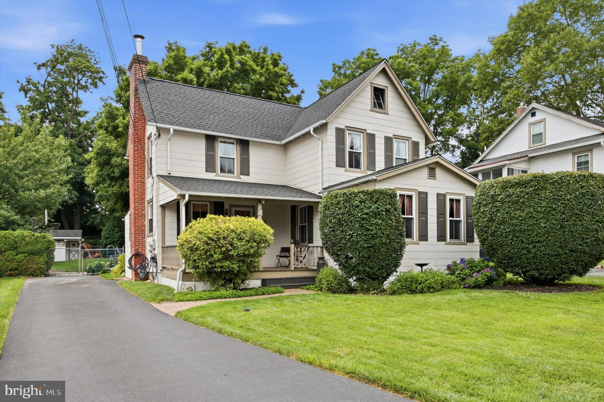 Brimming with warmth and timeless charm, this inviting Colonial offers the perfect blend of character, comfortable living spaces, and thoughtful updates in an exceptionally convenient, walkable location in the highly acclaimed Tredyffrin-Easttown School District. A welcoming covered front porch sets the tone for the home, leading into an extended living room and formal dining room highlighted by a charming corner cabinet. The updated kitchen features refinished white maple cabinetry, granite countertops, subway tile backsplash, peninsula seating, a pantry, wood plank flooring, and a gas range, dishwasher, and microwave.Just off the kitchen, a versatile den with a walk-in closet provides additional living space and direct access to the multi-level deck overlooking your own private backyard retreat. Enjoy summer days by the kidney-shaped Viking fiberglass in-ground pool, surrounded by a fenced yard, a large shed/cabana with electric, and a beautiful mature magnolia tree that enhances the home's peaceful setting.The first floor also includes a convenient full bath with laundry area. Upstairs, you'll find three comfortable bedrooms, including a spacious primary bedroom with four windows that welcome abundant natural light and refreshing cross breezes, along with a full ceramic tile hall bath. A walk-up attic provides excellent storage.Additional highlights include replacement windows, a newer roof, newer driveway, and an electric vehicle charging hookup.Ideally located within walking distance of both the Paoli and Daylesford train stations, the Paoli Shopping Center, and other everyday conveniences, this exceptional property offers the rare combination of timeless charm, thoughtful updates, and an unbeatable location. Best of all, you'll have the opportunity to enjoy the remainder of summer from your own private backyard oasis while getting comfortably settled before the busy fall season.