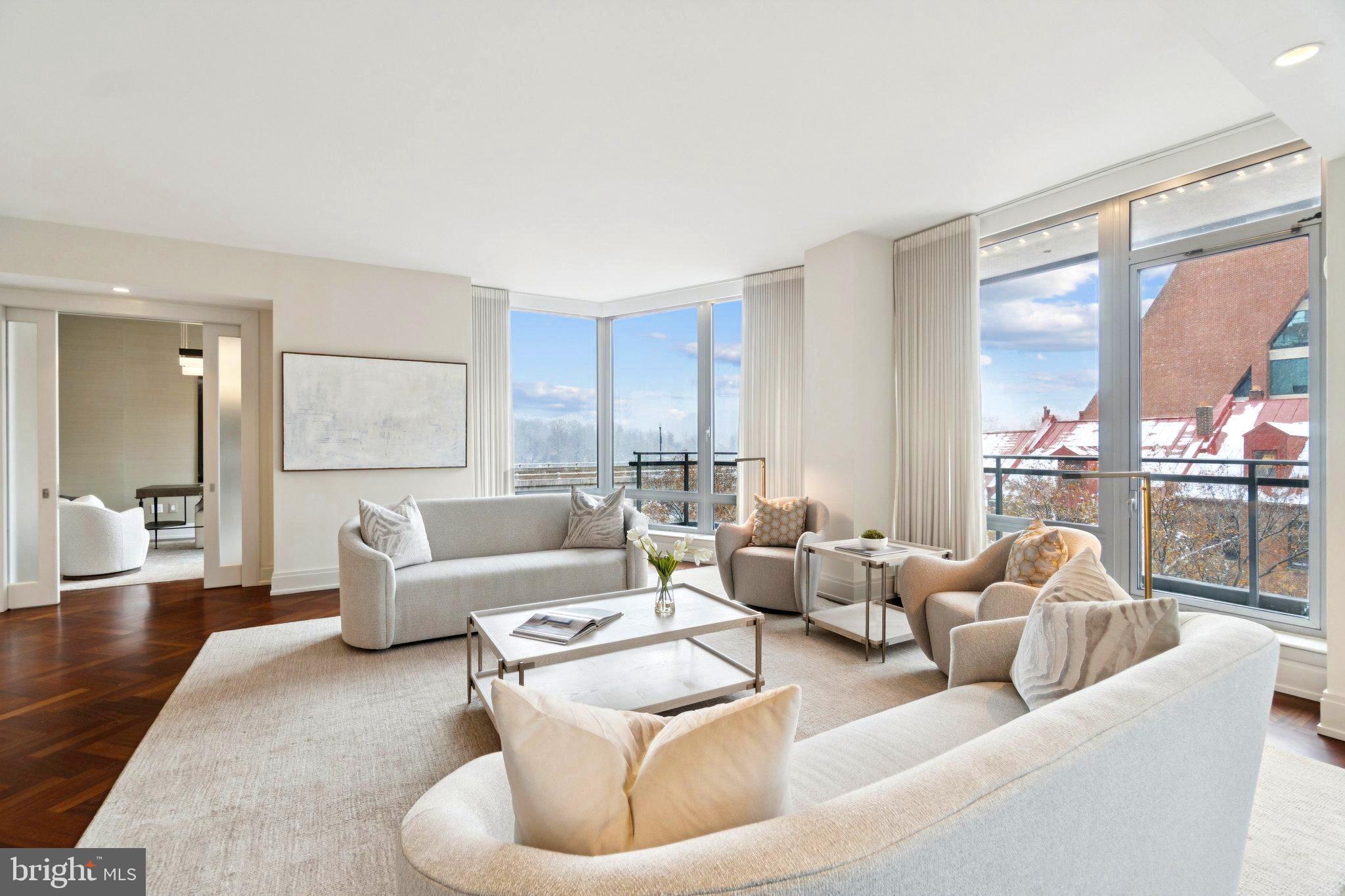 Elegance | Location | Sophistication abounds in this stunningly renovated residence at the Ritz Carlton.  The open floor plan allows for optimal entertaining and enjoyment. Complete with spectacular bar with 3 large wine/beverage refrigerators. Custom up-lighting. Customs closets. Quality craftsmanship. This 2 bedroom has been transformed.  Special architectural touches and accents throughout. Spa-like Master Bath comes complete with it's own Sauna.  Extra large  Primary closet has custom built-ins.  Balconies, and terraces. The Residences at Georgetown offers unparalleled, 5-star service and steps to waterfront, park, restaurants and all that Georgetown has to offer. Owners enjoy 24-hour Ritz-Carlton-level concierge and hotel services, security, valet parking, spa/gym usage, front desk  and much more! Steps from Georgetown's vibrant M Street and Wisconsin Avenue, with upscale shopping, dining, public transportation, and nightlife. Nearby attractions include the C&O Canal, Georgetown Waterfront Park, Thompson Boat Center for  boating, and easy access to the National Mall, Smithsonian Museums, and Georgetown University, George Washington University.