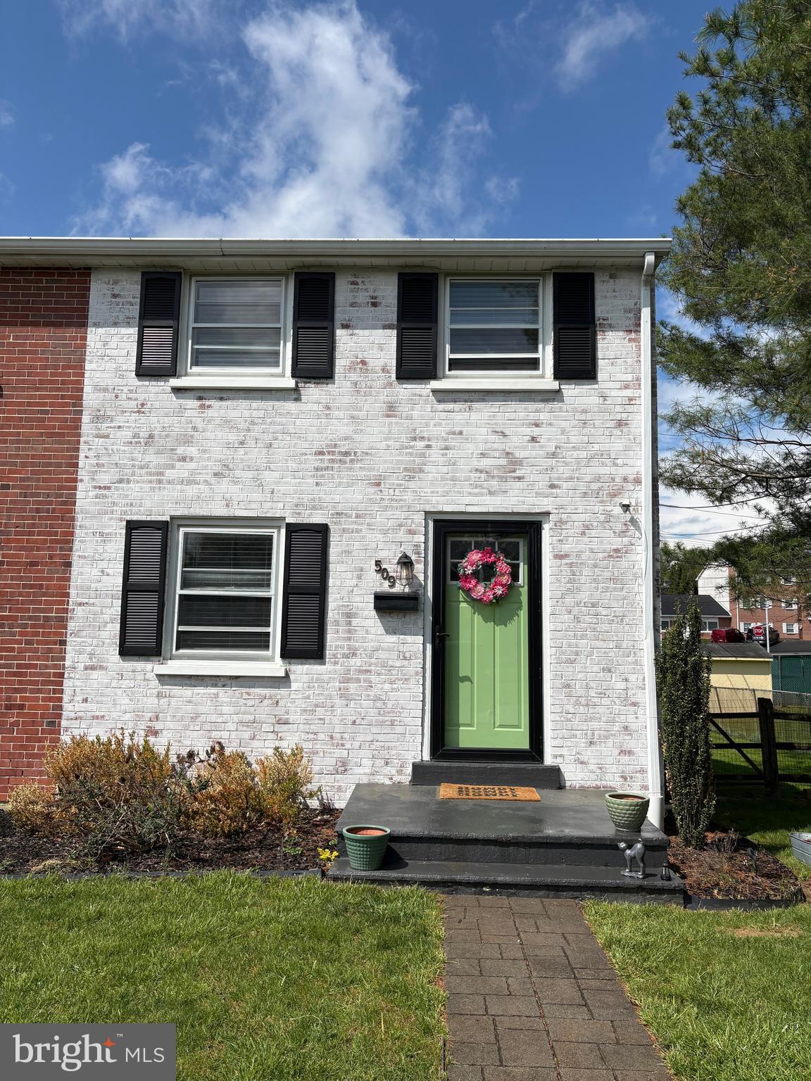 Welcome to 509 D Street, an adorable Twin nestled in the heart of Kennett Square Borough. The location is truly unbeatable-just down the street from the popular Victory Brewery and within easy walking distance to Kennett Square’s vibrant restaurants, shops, and the Chester County Library.This 3-bedroom, 1-bath home offers the opportunity to move right in without the need for updates. A large fenced-in backyard, spacious patio perfect for grilling, and dedicated entertainment area make outdoor living effortless.Inside, the open living and dining area provides an inviting space for everyday living and gatherings. A custom barn door adds rustic charm, while the light-toned hardwood floors brighten the entire first level.The renovated kitchen features stainless steel appliances, marble tile flooring, subway tile backsplash, butcher block countertops, and painted cabinetry accented with gold hardware. Upstairs, the updated bathroom includes a new sage green vanity for added storage, along with subway tile throughout the tub/shower and coordinating floor tile for a seamless, modern look.Two guest bedrooms with a shared closet offer flexible use, ideal for bedrooms, home offices, or hobby spaces. A hallway linen closet provides ample storage just outside the spacious primary bedroom, which includes two full-length closets. Hardwood flooring continues throughout the second floor, creating a warm, cohesive feel.The home also includes a large unfinished basement with excellent potential, whether you envision a second living area, home gym, or expanded storage. The washer and dryer are conveniently located in the rear section of the basement.Why rent when you can own your own home at a monthly cost less than a one bedroom apartment??Agent is related to the Owner.