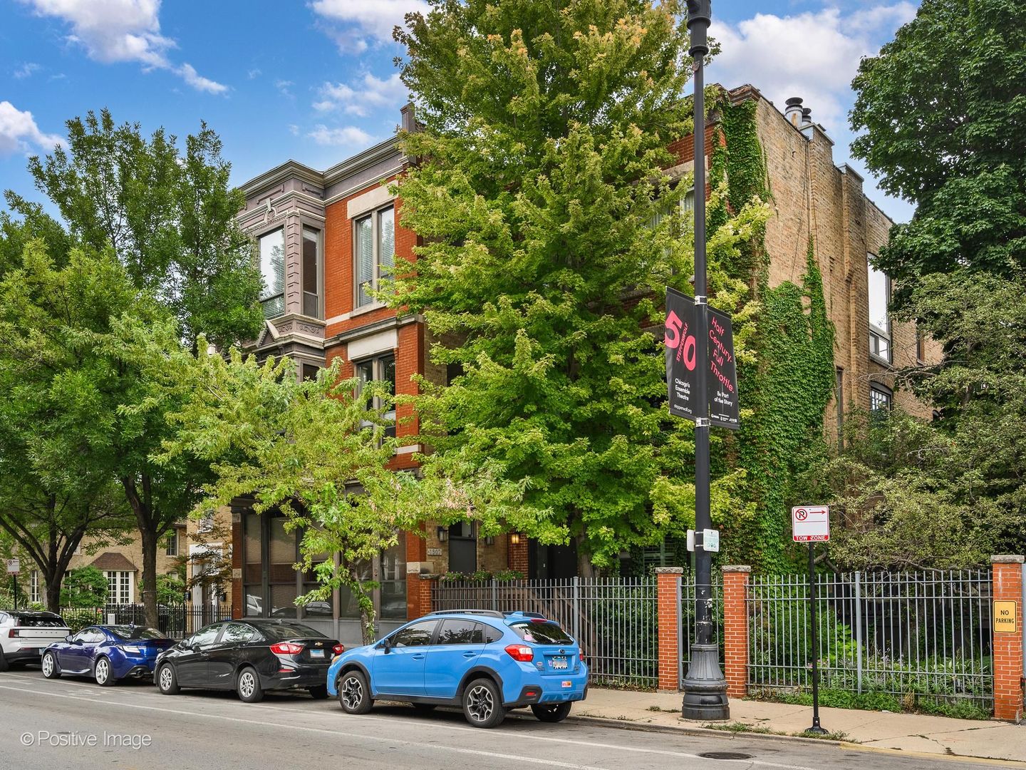 Beautiful top-floor 2BR/2BA condo in the heart of Lincoln Park! Bright, airy, and beautifully remodeled, this exceptional home features soaring 11' ceilings, multiple skylights, oversized windows, treetop views, and gorgeous walnut-stained hardwood floors throughout. The open, redesigned floor plan showcases a stunning kitchen with 42" cabinetry, quartz countertops, large island with breakfast bar, timeless backsplash, and stainless-steel appliances. Spacious living room with fireplace flows into the dining area and opens to a private back deck, perfect for entertaining or relaxing. Generous primary suite with ample closet space and remodeled bath with dual sinks. Second bedroom is conveniently located near the second remodeled full bath. Additional highlights include in-unit laundry, newer HVAC with central air, and gated parking included. Unbeatable Lincoln Park location just blocks from the Armitage CTA, with restaurants, shopping, DePaul, the Lakefront, Downtown, and expressways all easily accessible. A beautifully updated home in an exceptional location and neighborhood. Must see!!