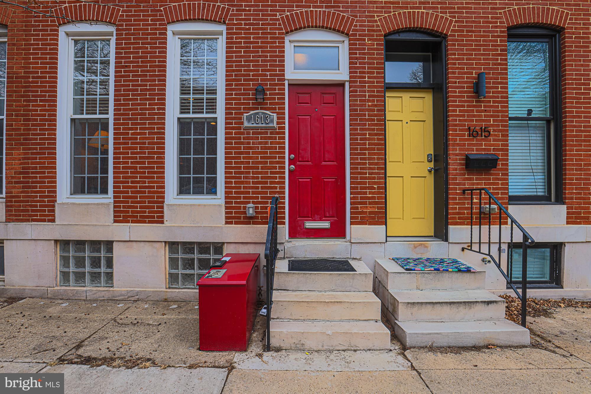 GORGEOUS 3 Bedroom 2.5 Bath BRICK  Front Federal Hill Townhome with Private Parking in Rear of the Property * Approximately 2,000 sqft of living space * Features Include:  GLEAMING hardwood floors in the SPACIOUS living room and dining room * LARGE eat in kitchen with GRANITE countertops, island with seating, stainless steel appliances, pantry and recessed lighting * Half bath on MAIN level * Freshly painted * Updated bathrooms * New hot water heater * On the UPPER level you will find a PRIMARY suite * TWO additional bedrooms.  a FULL bath and laundry * Partially finished basement * Rear deck off 2nd floor bedroom with spiral staircase to a ROOFTOP deck with a stunning view of the City * Close to restaurants * This beautiful property has been METICULOUSLY maintained!!