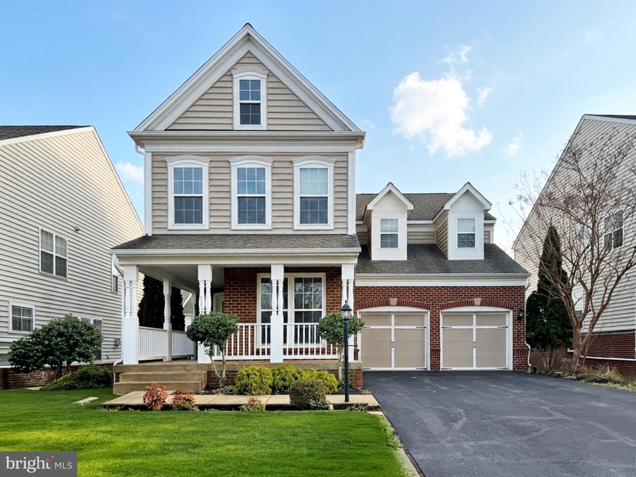 Built by Pulte Homes, this beautifully updated Allegheny model offers over 4,000 square feet of refined living across three finished levels in the heart of sought-after Brambleton. With 5 bedrooms and 4.5 baths, this home seamlessly blends timeless architecture with modern upgrades designed for today’s lifestyle.A welcoming front porch sets the tone, while rich hardwood flooring, elegant moldings, and abundant natural light define the main level. The gourmet kitchen anchors the home with cherry cabinetry, an oversized center island, gas cooktop, double wall ovens, stainless steel appliances, and a sun-filled breakfast area with access to the backyard—ready for your custom outdoor design. The adjacent family room features a gas fireplace, creating a warm and inviting gathering space. A private main-level office with French doors offers the perfect work-from-home setting.Upstairs, four spacious bedrooms, a flexible loft area, and a convenient upper-level laundry room provide both comfort and functionality. The expansive primary suite impresses with a tray ceiling, generous walk-in closet, and a spa-inspired bath featuring dual vanities, a soaking tub, and a glass-enclosed shower. Fresh carpet and updated lighting enhance the upper level.The fully finished walk-out lower level is designed for entertaining, complete with tile flooring, recessed lighting, built-in speakers, and a kitchenette. A legal fifth bedroom and full bath create an ideal guest suite or private retreat.Recent updates include fresh interior and exterior paint, updated lighting and mirrors in bathrooms, bedrooms, and the dining room, a new hot water heater and sump pump installed in December 2025, a new microwave added in February 2026, a newly sealed driveway as of February 2026, and a sprinkler system.Ideally situated minutes from major commuter routes, shopping, and dining, residents enjoy access to Brambleton’s premier amenities, including pools, tennis and basketball courts, scenic trails, lakes, tot lots, and a dog park. The HOA includes Verizon Fios, trash, recycling, yard waste, and snow removal for added convenience.Offering generous living spaces, thoughtful updates, and a prime location within walking distance to the elementary school, this exceptional home presents a rare opportunity in one of Loudoun County’s most desirable communities.