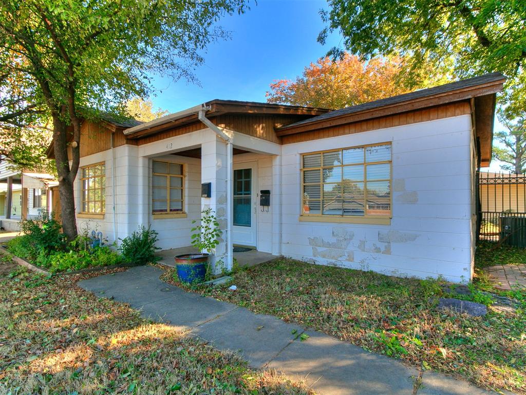 Discover this income-producing duplex at 412 N Baumann Ave in historic downtown Edmond—two separate units on one MOL 0.23-acre lot, offering walkable access to shops, restaurants, parks, and the University of Central Oklahoma. Total living space is MOL 1,458 sq ft, generating MOL $1,675/month in rent ($975 front + $700 back). Zoned for Edmond Public Schools; minutes from I-35.
Front House (Main Unit): Built 1949; brand-new central HVAC (
