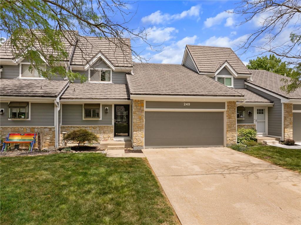 Seldom offered and highly desirable—a Lakewood Bay townhome with a 2-car attached garage and three true bedrooms!
Designed with privacy and functionality in mind, each bedroom is thoughtfully situated on its own level. The open-concept main floor features a kitchen with center island, a dedicated dining area, and an airy great room with vaulted ceilings and a fireplace—perfect for effortless entertaining. The generously sized primary suite offers a quiet retreat.

The attached 2-car garage and true 3-bedroom layout make this home uniquely valuable in the neighborhood.

Enjoy low-maintenance living with an HOA that covers the roof, siding, property insurance, lawn care, snow removal, and trash service.

All this, plus full access to the exceptional Lakewood lifestyle—golf, pools, walking trails, sport courts, and serene lake activities.
