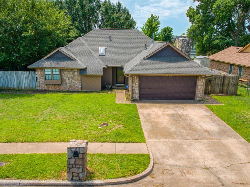 Lets go swimming!   Florida room overlooking in ground pool.  Vaulted ceilings in living and great bedroom with beams and fans.  Engineered wood floors and granite counter tops.  Solar tubes allow natural light.  Master bed has a large walk in in addition to  another closet.  Ironing board folds down in laundry room.   Kitchen has  5 burner gas stove and tons of counter space and storage and a few of the pool.  The Florida room has a heater for cool nites.  Large storage building for pool supplies and garden equipment.  Extra wide lot for possible back access. Pool was not opened this year and has protective cover.
