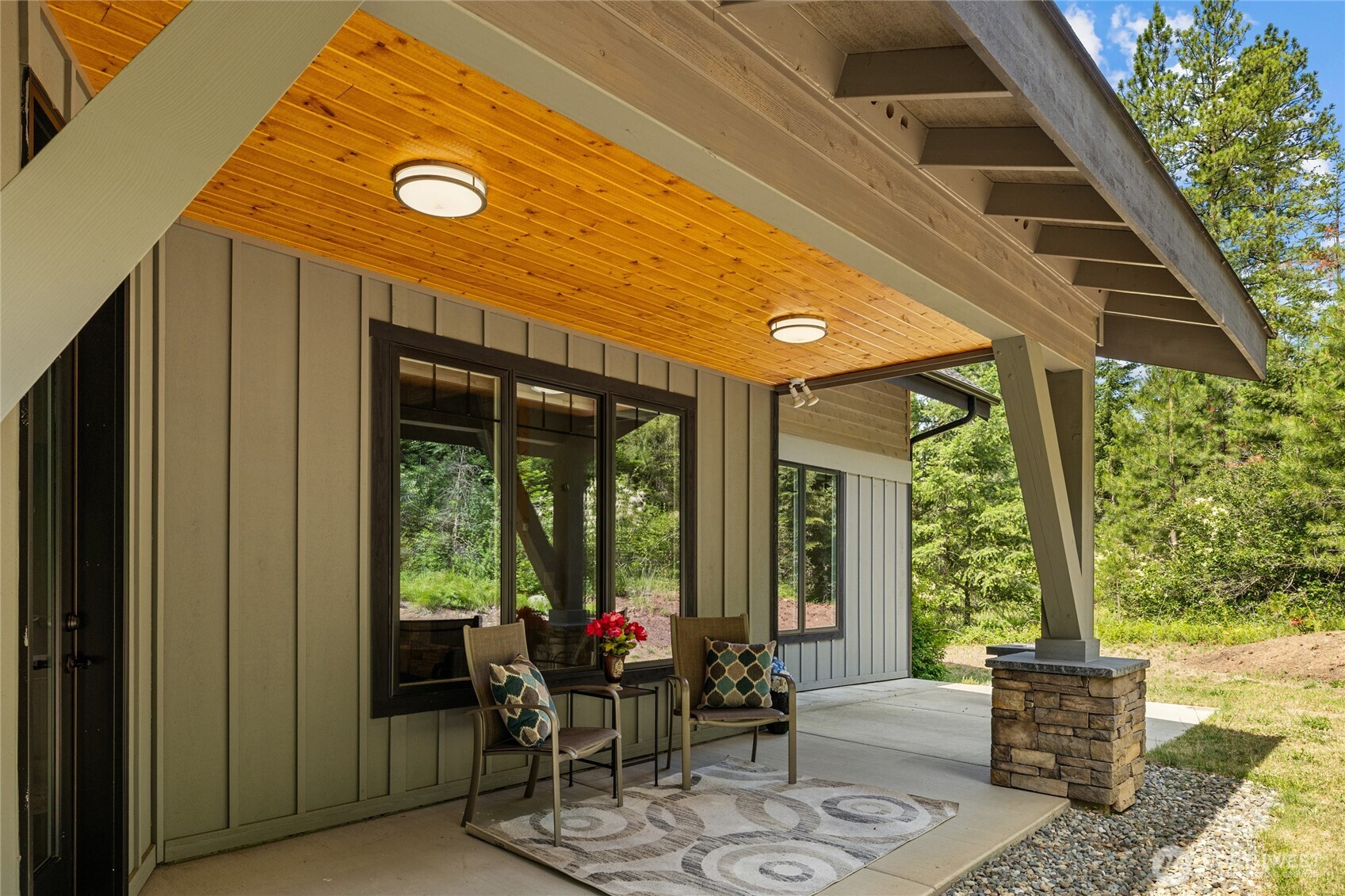 Beautiful outdoor covered patio that backs up to a green belt.