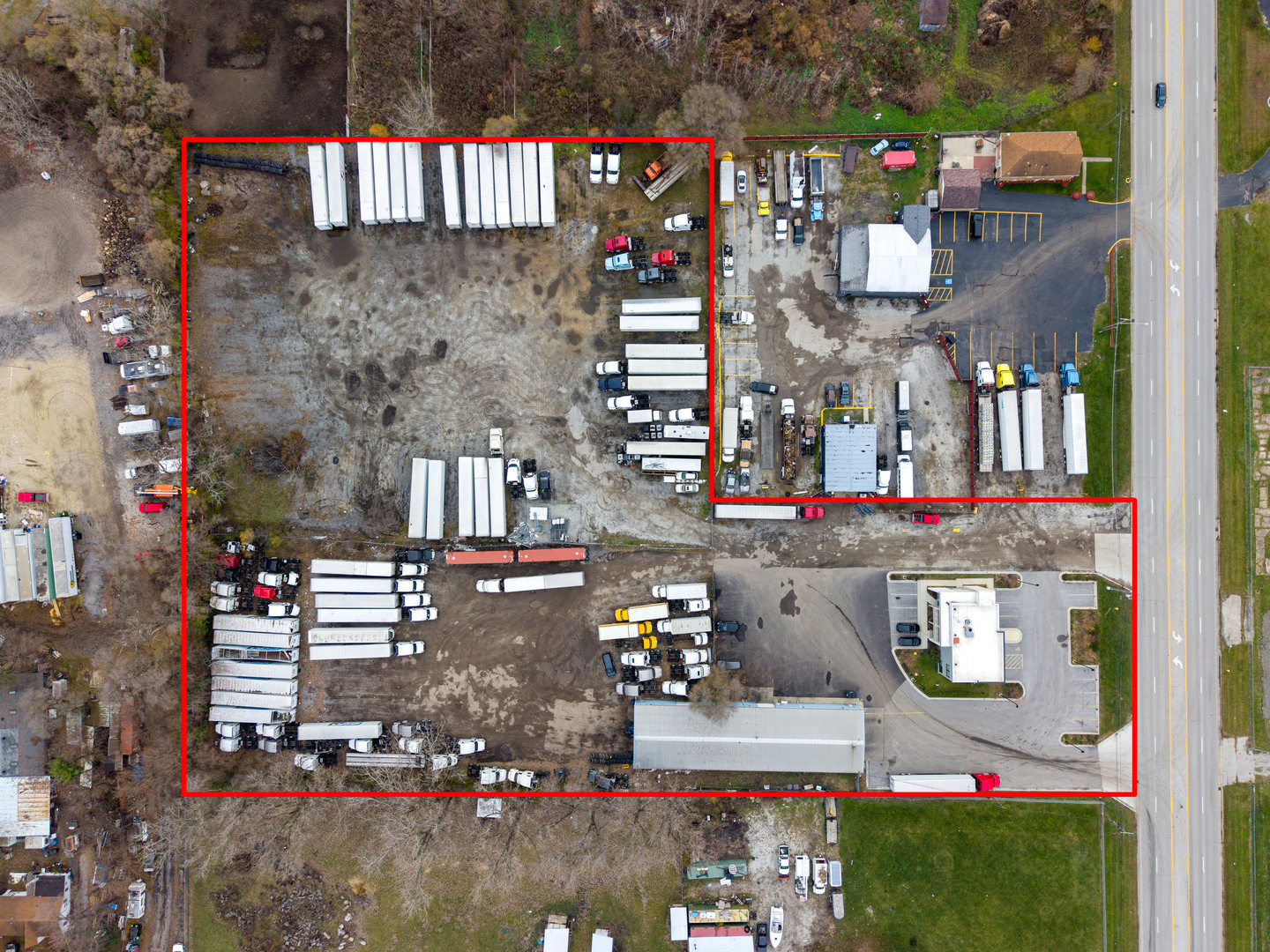 PARTIAL SELLER FINANCING AVAILABLE!!  Prime owner-user or investment opportunity featuring 4.69 acres of secured outdoor storage with functional industrial improvements. Property includes a 6,100 SF warehouse/maintenance building with six drive-in doors (14' wide x 12-14' high) and 16' clear height, along with a 2,800 SF two-story office building offering multiple private offices, conference rooms, and break areas.  The property is partially leased, with half of the shop currently tenant-occupied. The long-term tenants are willing to remain, providing stable income for investors or supplemental revenue for an owner-user.  Ideal for transportation, contractor, equipment storage, or logistics users, the site offers rare outdoor yard capacity and strong proximity to major expressways including I-57, I-294, and I-80, as well as CN Intermodal, Midway Airport, and Downtown Chicago. A versatile opportunity combining warehouse functionality, office infrastructure, income potential, and expansive secured yard space.
