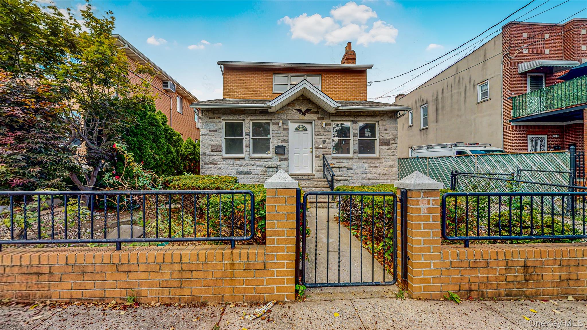 Rare opportunity in Astoria! Welcome to this fully detached single-family home situated on an impressive 40 x 100 lot, offering a combination of space, privacy, and parking that is hard to find in the neighborhood. The home features a private driveway and detached two-car garage, providing ample off-street parking and additional storage. Inside, you'll find a spacious and comfortable layout featuring a formal dining area, a welcoming living room with a fireplace, and 3.5 bathrooms throughout the home. Central air conditioning provides added comfort year-round. The basement offers additional space and features its own private exterior entrance, adding flexibility to the home's overall layout. Outside, the oversized 40 x 100 property provides generous outdoor space with plenty of room to enjoy, entertain, garden, or simply relax. With a fully detached layout, private driveway, two-car garage, substantial lot size, and convenient Astoria location, this property presents a truly unique opportunity to own a single-family home with features rarely found together in the neighborhood.