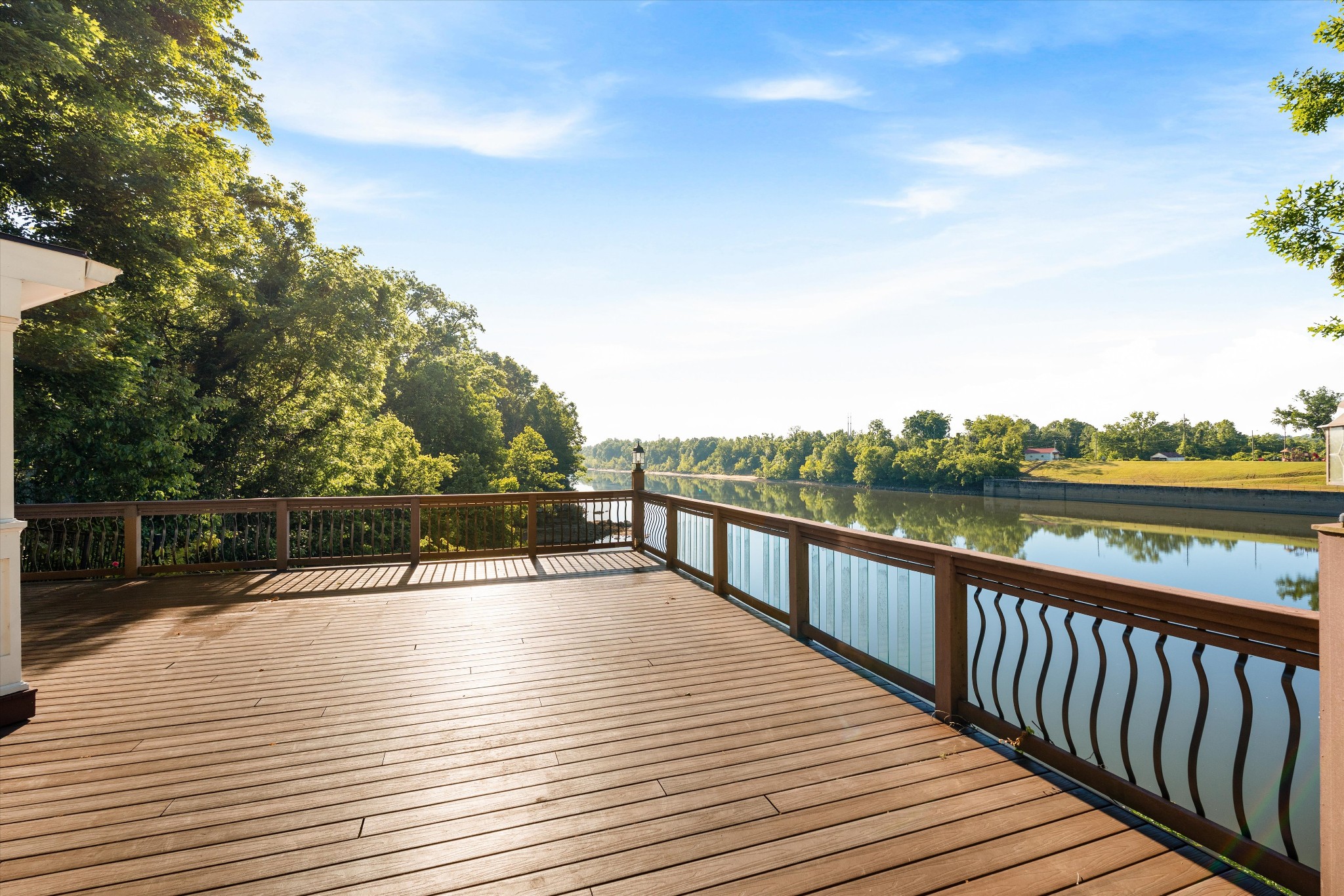 Welcome to riverfront living in scenic Montague—Madison’s best-kept secret. This beautifully renovated home on the Cumberland River offers tranquility and convenience just minutes from Inglewood, downtown and East Nashville. A thoughtful renovation includes new hardwood and plank flooring, fresh interior paint, and a clean, modern aesthetic that enhances the natural light. Upstairs, the large owner’s suite features a wall of windows overlooking the river. A second upstairs bedroom has its own bathroom , with the third bedroom downstairs. Step outside and relax on the massive deck with panoramic river views in a private, natural setting.