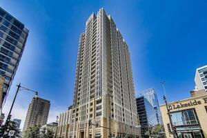 One of a Kind is the true definition of this spectacular penthouse unit located in the one of the premier buildings in the South Loop! This unit covers a half a floor with over 3500 sq feet with an additional 1100 sq feet of outdoor terraces that offer panoramic views of the north, east, west and south! There was not a detail spared in this unit, every inch of the unit offers designer level of quality! As you enter the foyer the high ceilings and the Italian marble floor that lead to the stunning living room which offers unobstructed views of the lake which  will take your breath away! The living room offers floor to ceiling windows, hardwood floors and access to terraces on both the north and south side of the space while feels open to the gourmet chefs kitchen! The kitchen was designed with custom cabinets, high end appliances, double oven, quartz counters along with a quartz backsplash! There are four spacious bedrooms in the unit which offer en suite bathrooms, custom closet organizers and heated floors in all the bathrooms! The master suite is stunning with floor to ceiling windows facing east and north, trey in lay ceilings and a small den area off the closet which can be used as a dressing room or office! The master bathroom is spa like with heated marble floors, massive walk in shower, double vanity and much more! The unit has been done with the highest level of quality, from the solid core doors to the crown molding, the custom lighting, no stone was unturned when finishing this unit! You will not find a unit with this kind of outdoor space either, lets not overlook a private 4 car garage within the parking garage, this is a value at this sq footage with these features! The building is a full amenity building with pool, gym, doorman! The location is hard to beat, walk to the lakefront, walk to Grant Park, Close to the Dan Ryan and I-55! Get inside this unit today to truly appreciate all the unit has to offer as it will not last long at this price point!