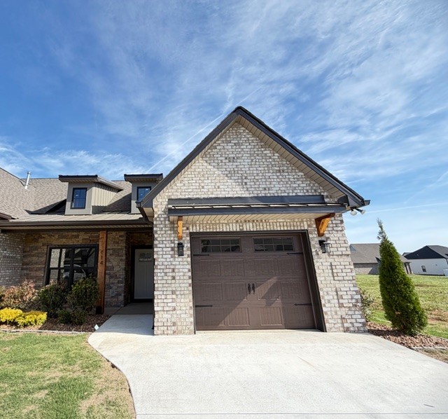 Welcome to easy living with a touch of luxury! This beautifully designed townhome, nestled inside a gated community near Tims Ford Lake, offers the perfect blend of comfort, convenience, and low maintenance living. Step inside to find a thoughtfully laid-out one level floor plan featuring gorgeous luxury vinyl plank flooring and granite countertops that add both style and durability. The kitchen is designed to impress with a spacious pantry, SS appliances, and plenty of room to cook, entertain, and gather. The primary suite is the true retreat, offering generous space to unwind and recharge after a long day. Enjoy peace of mind and more free time with community maintenance that covers lawn mowing, irrigation, and exterior upkeep-so you can spend less time working and more time enjoying everything the area has to offer, including nearby Tims Ford Lake.  HOA fees are $80 per month.