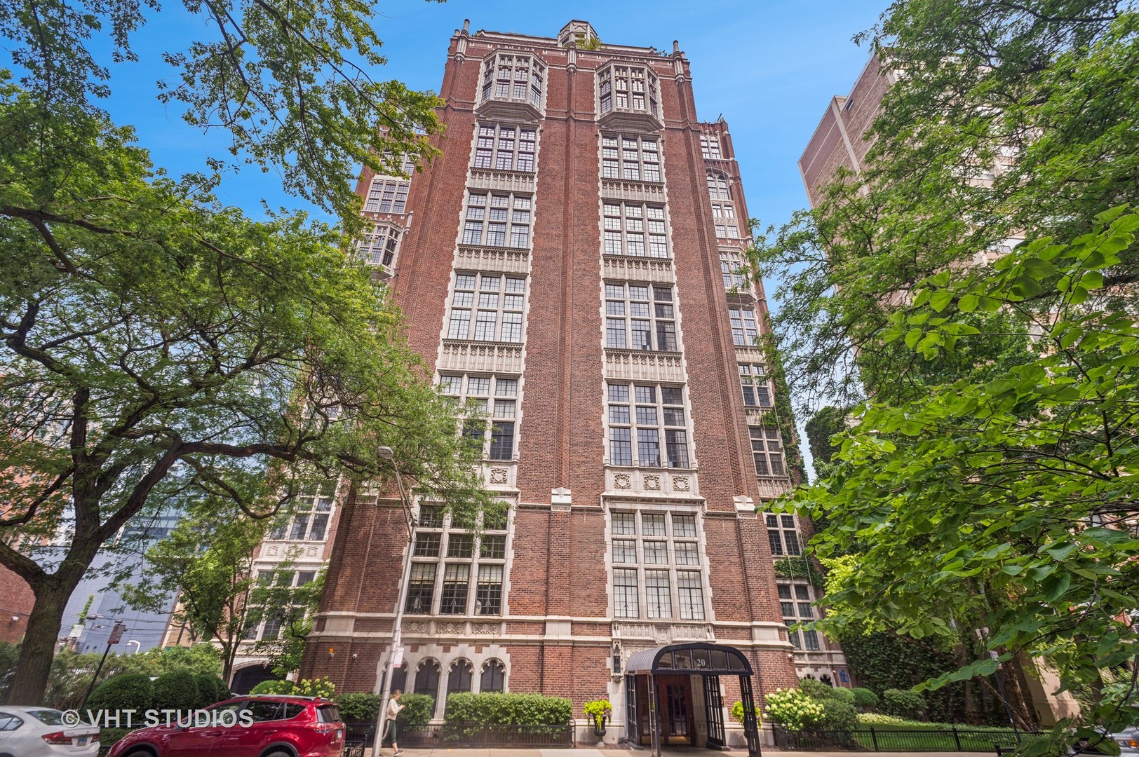 Fabulous two story living room with wood burning fireplace!  Separate dining room and gourmet kitchen great room.  Fantastic light from the two story south facing windows.  Parking available off site-Don't miss this one.