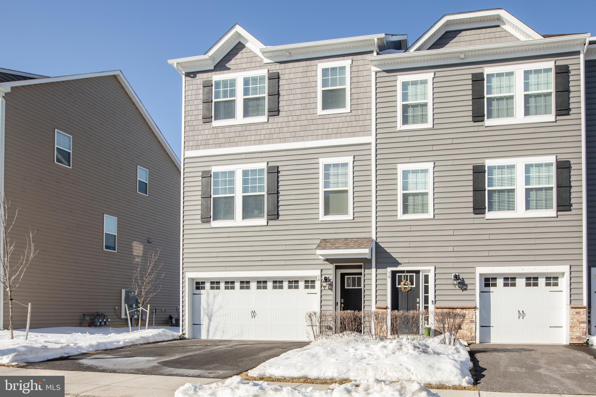 Welcome to this beautiful end of row Townhome in Signature Place  with 3 bedrooms two and half baths, and a two car garage with automatic garage lift, Entry level features a spacious family room with plenty of closet space, glass sliding door to your back yard,  this space would also be perfect for an  office,  guest room,  gym or a fourth bedroom, your choice.  Enter into Main level  which offers open concept, living room with plenty of windows for natural sunlight  and luxury vinyl plank flooring   that flows into the the well equipped kitchen with stainless steel appliances,  36 inch espresso cabinets, recessed lighting, quarts counter tops, breakfast island, dinning area, pantry and glass sliding doors to the deck.    Upstairs leads to the master suit with its own bath, large walk in closet along with two other spacious bedrooms, a full  bath with linen closet, and laundry room. Signature place is a commuters dream! This home is locate minutes from all major highways including  295, Route 38, Route 73, Route 70 and the New Jersey Turnpike plus  only minutes  to Moorestown and Cherry Hill. There are also many shopping and dining options just minutes from your home.