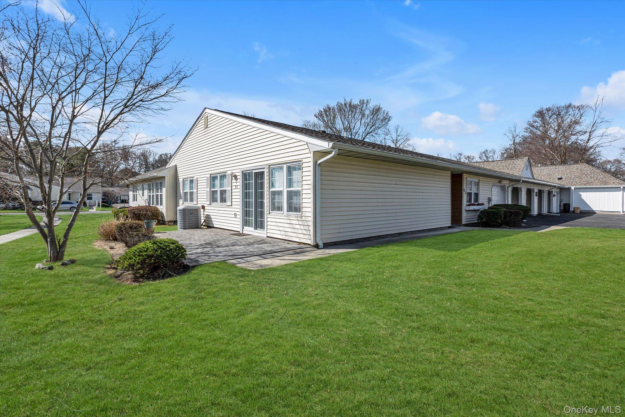 New to Market..Sunrise Village 55+. One of the Largest Carlisle Model Ranch Condo with 1,230 Square Feet End unit open and close to Clubhouse. Home Features Entry Foyer, Dining Room/Living Room w/Sliding Doors to Backyard Paver Patio, Eat-in-Kitchen Tile floors kitchen and hallway, Master Bedroom w/Master Bath w/Shower & WIC, 2nd Bedroom w/Double Closet, Full Bath w/Tub, vinyl wood flooring in bedrooms. Laundry Rm w/Hot Water Heater & Entry Into 1-Car attached Garage w/ attic Pull Downstairs. Wood floors in Livingroom/Dining room, Crown Moldings Throughout.  New Roof. New Hot water heater. Gated Complex w/Jitney to Stores. Community Clubhouse, heated Inground Pool, Bocce Ball . monthly maintenance of $550.75 Includes Ground Care, Snow Removal, Water, Sewer, Basic Cable and Phone. $1000 one-time move in fee,