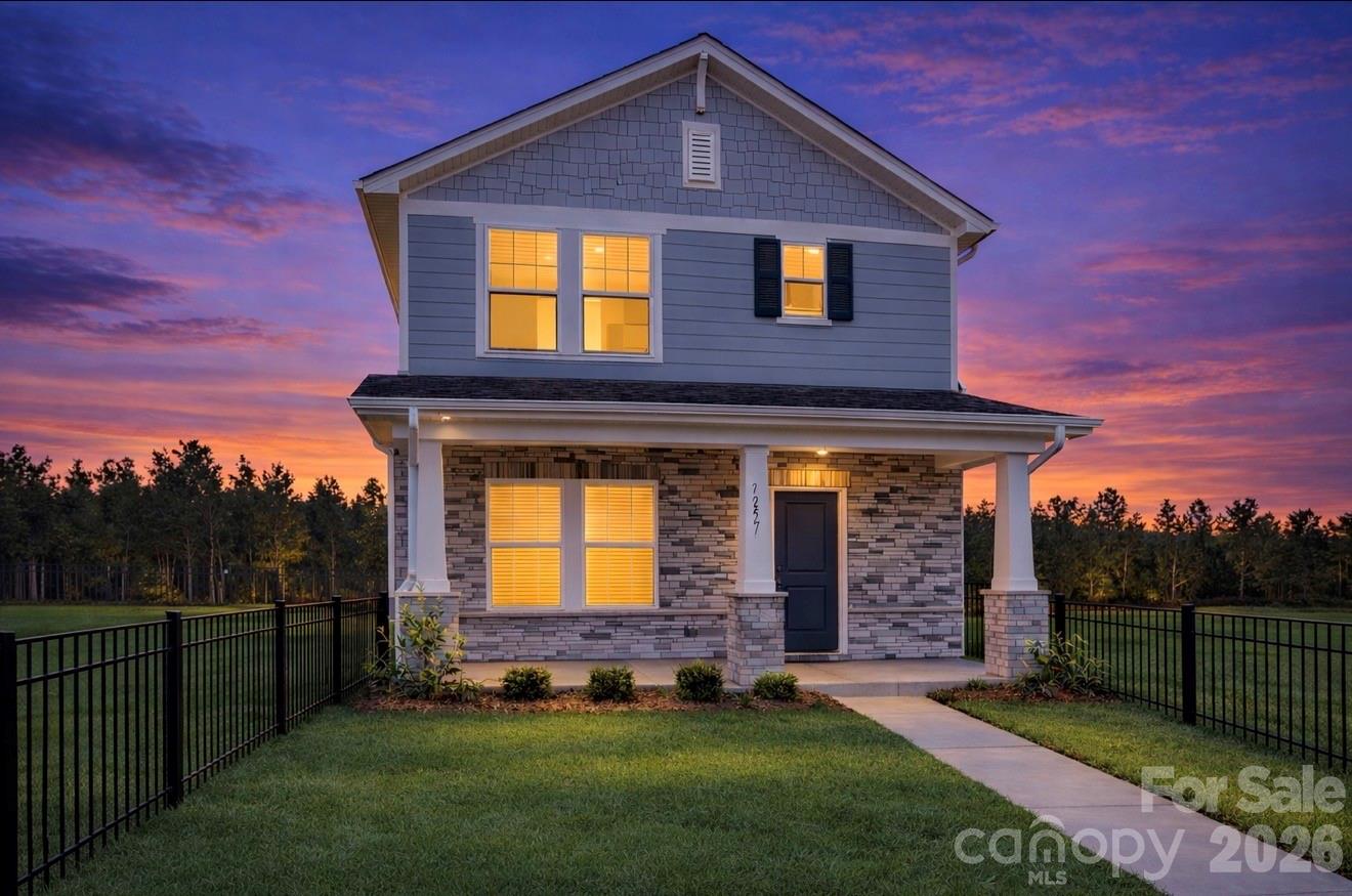 Looking for new construction near Charlotte without the city congestion? Welcome to Nolan Farm in Gastonia. With convenient access to I-85, this brand-new energy-efficient Meritage home offers modern living in one of Gastonia’s growing areas while providing a quick commute to Uptown Charlotte and Charlotte Douglas International Airport. This 3 bedroom 2.5 bathroom home is also minutes from Downtown Gastonia’s revitalized district featuring restaurants, breweries, and local shops. Nearby, Franklin Square and Eastridge shopping areas provide convenient access to grocery stores, retail, dining, and everyday essentials. This thoughtfully designed two-story home features with an open-concept main level where the kitchen island overlooks the dining area and great room, creating an ideal space for everyday living and entertaining. The kitchen showcases quartz countertops, modern cabinetry, and stylish finishes throughout. Upstairs, the private primary suite includes dual vanities and a spacious walk-in closet, while a small second-floor flex nook provides the perfect place for a reading chair, desk, or workspace.Enjoy relaxing on the covered front porch overlooking the fully fenced front yard, adding charm and curb appeal to the home. The property also features a rear-facing two-car garage, helping maintain the neighborhood’s clean streetscape while offering convenient parking and storage.Additional highlights include washer, dryer, refrigerator, and blinds included, making this home move-in ready.Outdoor enthusiasts will appreciate being approximately 15 minutes from Crowders Mountain State Park for hiking and scenic overlooks, and about 20 minutes from Lake Wylie for boating, waterfront dining, and recreation. Residents of Nolan Farm enjoy community amenities including a swimming pool, splash pad, and sports courts within a growing community just outside Charlotte.Each home is built with innovative, energy-efficient features designed to help you enjoy more savings, better health, real comfort, and peace of mind while offering the perfect balance of modern living, Gastonia convenience, and quick access to Charlotte.