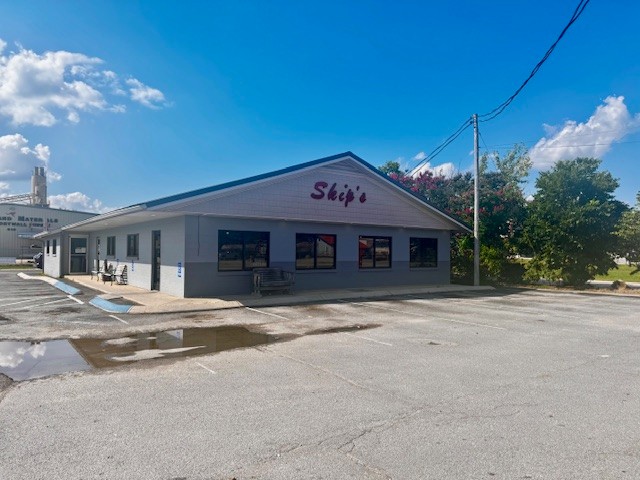 Step into opportunity with this Well-Established restaurant, fully furnished and ready for business from day one. This turnkey property features a spacious dining area, a fully equipped commercial kitchen, and plenty of parking. All furnishings, fixtures, and equipment are included allowing you to seamlessly continue operations or bring your own vision to life. With a strong local presence, ample parking, and a layout designed to accommodate both dine-in and carryout customers, this restaurant is perfectly positioned for success.  5' gas grill, 3' tabletop electric grill, 35/45 gal. gas deep fryer, electric bread warmer, sandwich prep cold bar, walk in freezer, walk in cooler, 6' steam bar, and so much more!!