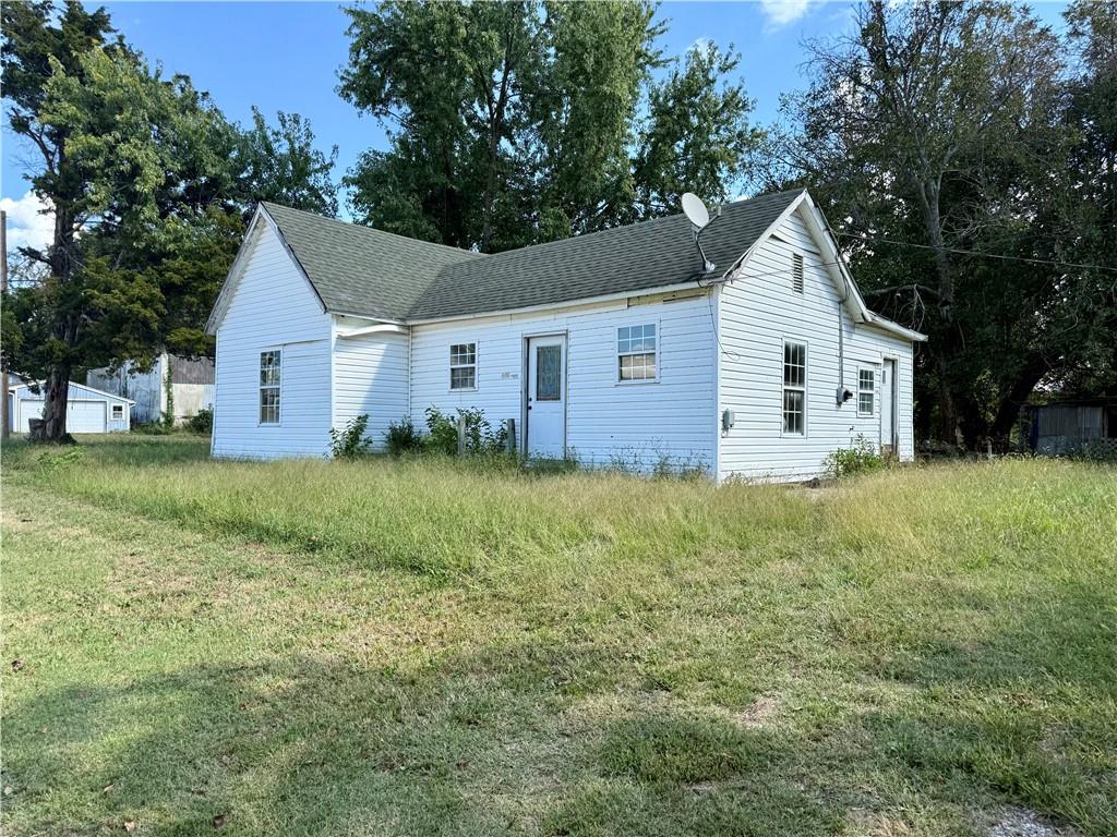 Looking for a project with promise? This 2 bedroom, 1 bathroom home in Rich Hill sits on a corner lot and is ready for a fresh start. Bring your ideas, tools, and vision — with the right updates, this fixer-upper could be transformed into a solid home or smart investment.