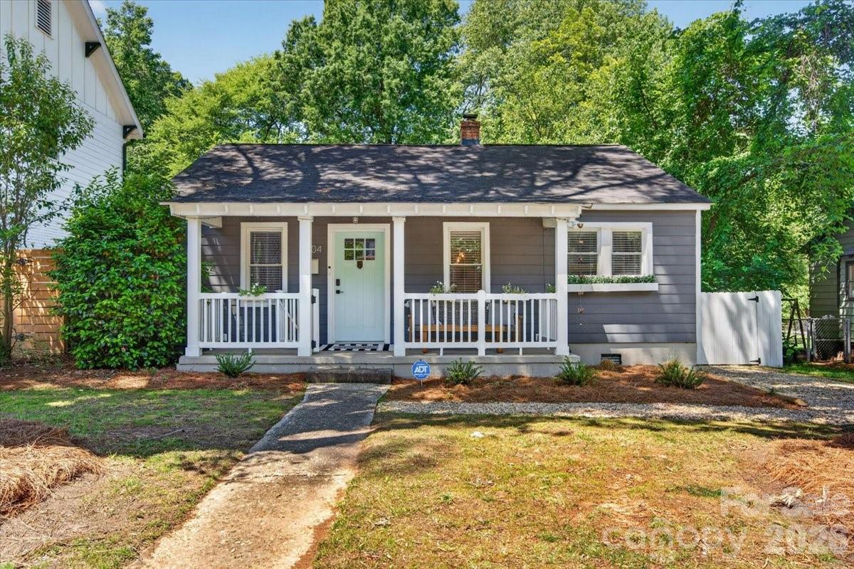 In the heart of Charlotte’s beloved Arts District, 904 Academy Street delivers classic bungalow charm, a deep lot full of potential, and front-row access to the best of NoDa living. Available fully furnished, this cheerful 2BR/1BA home is investment ready or ready to simply enjoy from day one with the perfect balance of charm, function, and potential.Inside, the open living area flows into an updated kitchen featuring quartz countertops, soft-close cabinetry, a large peninsula with seating, dining area, stainless steel range, vent hood and dishwasher, clever pantry space, stylish backsplash, and updated lighting. Beautiful original hardwood floors run through the living room, hallway, and both bedrooms, each offering TWO deep closets for surprisingly generous storage. The bathroom blends function and charm with tile extending to the ceiling, shampoo nook, a pedestal sink, and additional storage, while built-in cabinetry surrounds the full-size stackable laundry area for even more thoughtful organization.Recent improvements include fresh interior and exterior paint, a brand-new front door, newly installed front patio railing, refreshed landscaping, and a new gravel driveway and walkway extending beyond the fence line toward the back of the property. A sizable freshly painted shed matching the home sits in the deep fenced backyard alongside a concrete patio, creating space to entertain, garden, relax, or simply let your dog roam.And the lifestyle? That’s the reason people fall in love with NoDa. Leave the car behind and walk, bike, or hop on the Lynx Blue Line for easy access to Uptown, Optimist Hall, Plaza Midwood, Villa Heights, parks, greenways and countless local restaurants, breweries, coffee shops, music venues, and neighborhood favorites.Whether you’re searching for charm, flexibility, a fully furnished investment opportunity, or to build on a future dream lot in one of Charlotte’s most sought-after locations, 904 Academy Street delivers affordable possibilities that are hard to find. PRICED TO SELL, don’t miss out on this amazing opportunity!