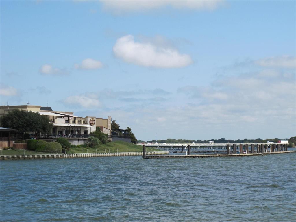 Great opportunity to own an amazing group of condos on the banks of Lake Ray Hubbard.  Great location near major highways I30 and 190 for easy access to anywhere in the metroplex, plus easy bus line access make these easy to lease. Being adjacent to Bass Pro Shops and just across from the emerging entertainment destination site of the Bayside Resort make these great Airbnb's as well, just remind your guests to bring their swim suits to enjoy the TWO swimming pools and their fishing poles and Kayaks to enjoy using right off the banks of the complex in beautiful Lake Ray Hubbard!   Every unit has a private patio or balcony with most offering fantastic lake views!! Short term rentals are allowed by the HOA. Well managed HOA and high occupancy rates make this an appealing opportunity that you should not miss.  Onsite property manager is willing to stay at a very reasonable rate making this a very low effort investment.  True cap rate of around 6% inclusive of all expenses including management.  Recent quick CMA shows that the price for purchasing these separately is around 500K more than these are listed for as a package, allowing you to create almost half a million of instant equity!  Owner may be willing to finance with a 25% down payment at 6.5% interest. No showings until substantial agreement on price and terms. Tenants pay electric.  All other utilities and exterior maintenance are covered by the HOA dues. All units have a fireplace and full size washer dryer connections as well as additional outdoor storage. Several units are currently leased at below market rates giving a nice upside opportunity for new owners. Owner is a licensed TX real estate broker.  Text for fastest response.  See transaction desk for more details. 15 units are two bedrooms and 7 are one bedrooms.  This package is for 22 units within a 252 unit complex. Each of the 22 units have a unique parcel ID number.