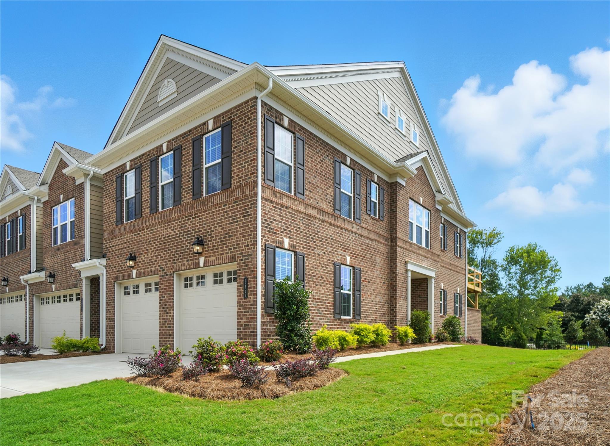 New Luxury Brick townhome in prime Ballantyne residential location! The Duke, a corner townhome has a North facing entrance and beautiful views of the wooded tree preserve from the abundance of windows in the home.  Entering the main floor, the foyer sits between the guest wing where you have 2 Bedrooms, a large Bath with Dual Vanities and the Main Laundry Room.  On the opposite side f the foyer, the garage entrance, Coat Closet , Stair case with storage underneath.  The large open living area on the second floor features a stunning Gourmet Kitchen with Kitchen Aid appliances, 42" White cabinets w/soft close, pull out shelves, under cab. lights, Farmhouse sink, beautiful White Quartz countertops, ceramic Backsplash and a Large Walk In Pantry.  A second floor Deck off the Large Great Room gives you additional entertaining  space.  Also on the 2nd floor, the Primary Bedroom with huge Walk In Closet where we have included a stacked Washer/Dryer giving you 2 Laundry locations.  On the 3rd floor you have the 2nd Primary Suite with sitting area, large Dual Vanity bathroom and walk in closet.  Walk 
in Attic Space provides easy access to your HVAC with plenty of extra room. This 4 bed/3.5 bath home is filled with light from an abundance of recessed lights and beautiful trimmed windows.   9 ft. ceilings with 8' doors on 1st and 2nd level along with upgraded LVP flooring elevate this  home.  Crown Molding, trimmed windows and 2" faux wood blinds throughout the home are a few of the upgrades that elevate the luxury feel of this home.

This is one of 17 homes remaining in our boutique community of 28 townhomes and one of the final two Duke plans.

Incredible Financing Incentives available through our preferred lender.  Listed price includes all upgrades!.

Ask about financing incentives offered with our preferred lender!