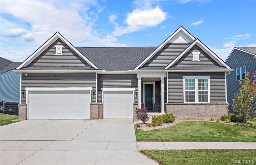 Estimated move in March-May. Welcome home to Kensington Ridge!  A thoughtfully designed Del Webb community for 55+ homeowners enriching an active lifestyle and low maintenance living with Ranch style floorplans.  This lakefront beauty is an open and welcoming floorplan, the Renown with second story loft.  The entry leads into a delightful open concept living arrangement.  Be a part of the party when entertaining guests in the light filled gathering room and expansive kitchen.  This kitchen is a true chef’s dream, complete with built-in appliances, a large working island and an oversized pantry doubling your available storage space.  At the end of the day, find yourself relaxing in the Owner’s suite that serves as a tranquil retreat, offering serene lake views and perfectly designed for privacy with a large ensuite bathroom and a two handsomely sized walk-in-closets that connect to the adjacent laundry room.  The loft is a perfect oasis for hosting weekend family and friends with a private bedroom, bath and it's own gathering space.  Along with gorgeous lakefront views and endless sunsets, you will enjoy a luxurious 16,800 sq. ft. clubhouse with full gym, swimming pool, tennis and pickleball courts all overlooking the community’s private no motor wake lake.  Residents also enjoy easy access to an abundance of restaurants and shopping in downtown Milford and the advantage of Kensington Metro State Park bordering to the West.