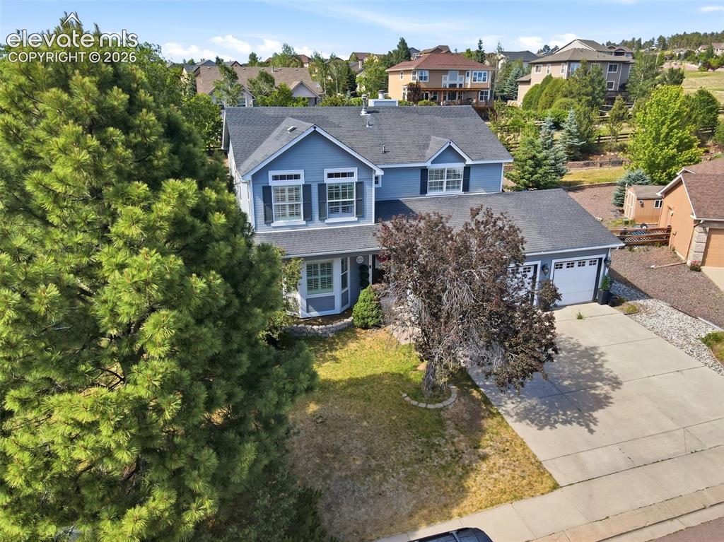 Now is the time to make your move, one of the best opportunities in Jackson Creek is ready to welcome its next owner * Thoughtfully updated & expertly curated for today's buyer, this home blends timeless style with modern design throughout * From the moment you step inside, the quality of the updates is immediately apparent * Rich hardwood flooring flows through much of the main level, while the spacious formal living & dining rooms create the perfect setting for entertaining * The remodeled kitchen has been thoughtfully opened and redesigned, showcasing contemporary finishes, improved functionality and an inviting atmosphere for everyday living * The generous eating nook walks out to an expanded patio, creating seamless indoor-outdoor living and easy access to the fully fenced backyard * Adjacent family room serves as a warm and inviting retreat, highlighted by a beautifully updated fireplace that anchors the space * The upper level features a luxurious primary suite with soaring vaulted ceilings and a stunning, remodeled, spa-inspired bath complete with a freestanding soaking tub, oversized shower, dual vanities with solid-surface countertops and a walk-in closet * Three additional bedrooms with ample closet space and a beautifully remodeled secondary bath complete the upper level * The finished basement expands the home's versatility with a stylish study, large recreation area, gaming space, step-behind wet bar and a remodeled fourth bathroom—ideal for movie nights, game days, or hosting family and friends. 5th bedroom is now being used as a man cave styled, beautiful study / office * The backyard is an extension of the home's lifestyle appeal, offering privacy with no close rear neighbors and multiple spaces to gather, relax, and enjoy the outdoors. A charming playhouse provides the perfect setting for endless summer adventures and lasting memories. This exceptional home offers the ideal combination of style, function and location. A must-see opportunity, hurry!