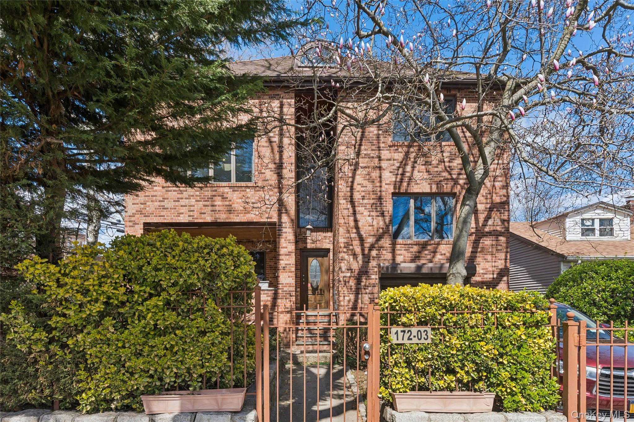 Rare 6-Level Architectural Masterpiece in North FlushingExperience an unparalleled lifestyle in this pristine, full-brick detached residence. Boasting an extraordinary six levels of living space and approximately 4,760 sq. ft. of "like-new" interior, this home is a rare find. Custom built in 2004, it offers the perfect marriage of structural integrity and modern luxury on a prime 55' x 100' corner lot.Standout Features:The Great Room & Entertainment Level: A spectacular high-ceiling Great Room designed for grand-scale hosting, featuring a cozy fireplace, a professional billiard table, and a custom wet bar.Private Master Level: The entire 4th level is dedicated to a palatial Master Suite—a true sanctuary featuring a private balcony and an extra-large, full-size Jacuzzi for ultimate relaxation.Versatile 6-Level Layout: Beyond the main entertaining floors, discover sun-drenched loft spaces on the upper levels (ideal for a home office or additional bedrooms) and a seamless split-level flow throughout.Modern Infrastructure: Enjoy the peace of mind of 21st-century construction, central air, and a meticulous full-brick exterior with a stone/brick privacy wall.Finished Lower Level: Includes a dedicated laundry area, half bath, and dual outdoor entrances from both the front and rear.Prime Location:Commanding the corner of 35th Ave and 172nd Street, this home is situated in the prestigious Queens 25 School District (PS 32, IS 25), moments away from local shops and transit.This turn-key residence represents a once-in-a-generation opportunity to own a high-capacity, custom-rebuilt home in North Flushing’s most desirable pocket.