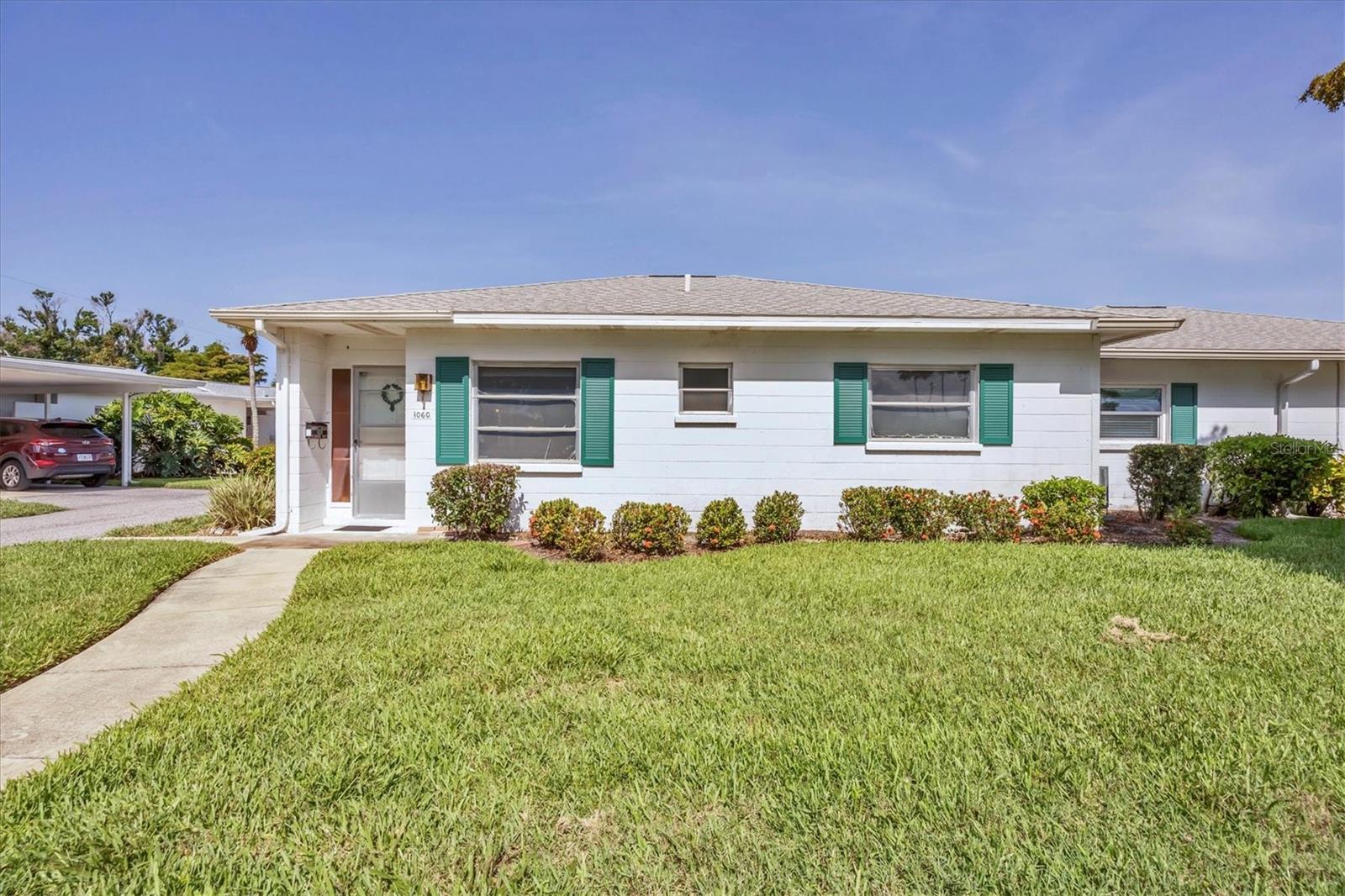 ***VENICE ISLAND*** This Sunny Updated End-Unit is in the Beach Manor Villas, an active 55+ Maintenance Free Community with a resort-style year-round heated swimming pool.  The gourmet Kitchen has wood cabinets, granite countertops and stain-less steel appliances with a pass-through to the Sunroom. This amazing home includes (2) spacious Bedrooms,1.5 Bathrooms, Laundry Room with washer/dryer hook-ups, plus a Private Covered Carport and a large brick paver Patio.  Quiet location and there are no shared walls with other units.  
Every day is a holiday at this friendly island community.  Make new friends while lounging at the pool or relax watching the breathtaking sunsets from your patio.  It’s only a short walk to the public beach where you can enjoy a delicious meal at the famous Sharky’s Restaurant overlooking the Venice Fishing Pier.  Close to Historic Downtown Venice shopping with amazing boutiques and restaurants, Venice Theater, Venice Airport, the Fairgrounds and the Venice Lake 18-hole golf course. Outdoor enthusiasts can experience boating and shelling excursions or a vigorous walk or bike ride along the Legacy Trail. It is always exciting to explore the extraordinary Venice Island.  
HOA fees includes professional management, property insurance, water, sewer, trash, cable TV, lawn service, pest control, exterior maintenance and a heated swimming pool with clubhouse.