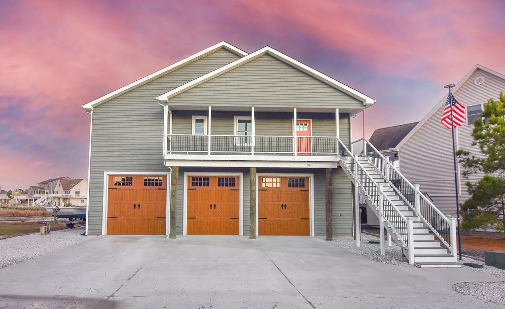 Experience waterfront living at its finest in this well maintained 4-bd, 2.5 ba home. The open-concept design features vaulted ceilings, quartz countertops, a gourmet 6-burner gas stove & engineered hardwood floors throughout the living spaces and bedrooms. Enjoy a spacious kitchen with a large walk-in pantry. The primary suite offers a walk-in closet & double bowl sink, while barn doors add rustic charm throughout. Insta-shade blinds provide instant privacy at the touch of a button. Entertain with a dining table that converts to a slate pool table, relax on the furnished deck, or take the included skiff out on the water. With an elevator and Murphy bed for flexible space, this home blends comfort, style and convenience. See associated docs for continuation of description.