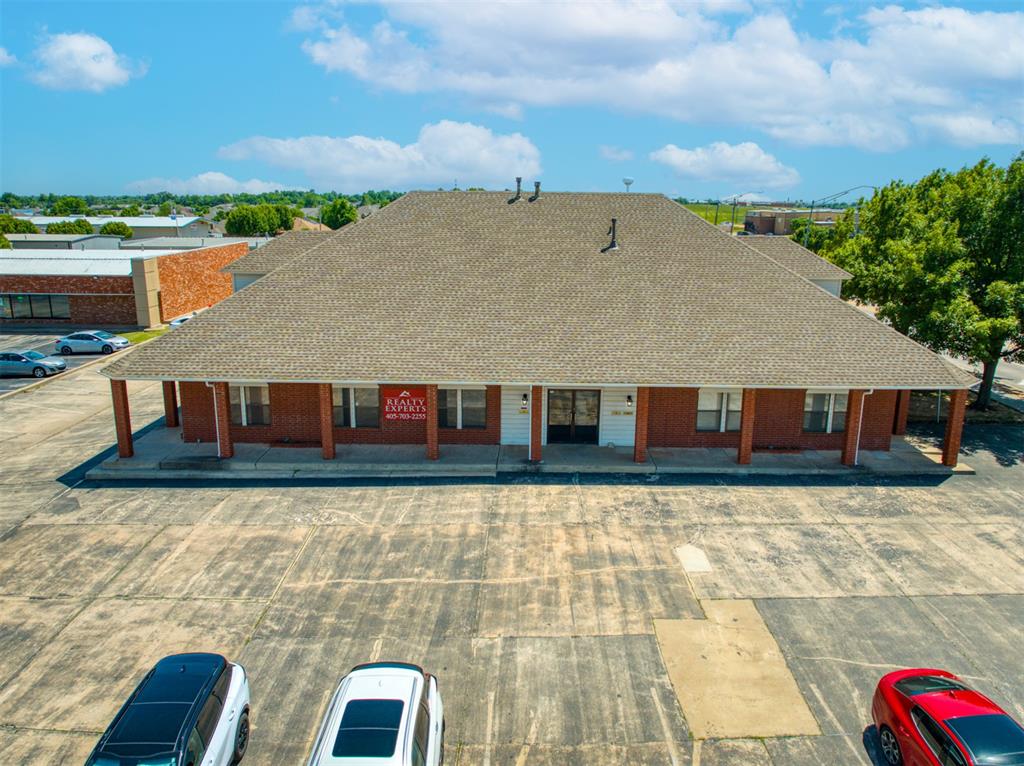 High traffic hard corner on SE 4th Street.  New underpass soon for railway.  4 separate suites  of offices.  Two up and Two down.  Individually metered for gas and electric.  Tenants would like to stay but leases are not long term.  There are 4 appx 600 ft storage closets upstairs not included in footage.  Listing Realtor is an owner of this property.
